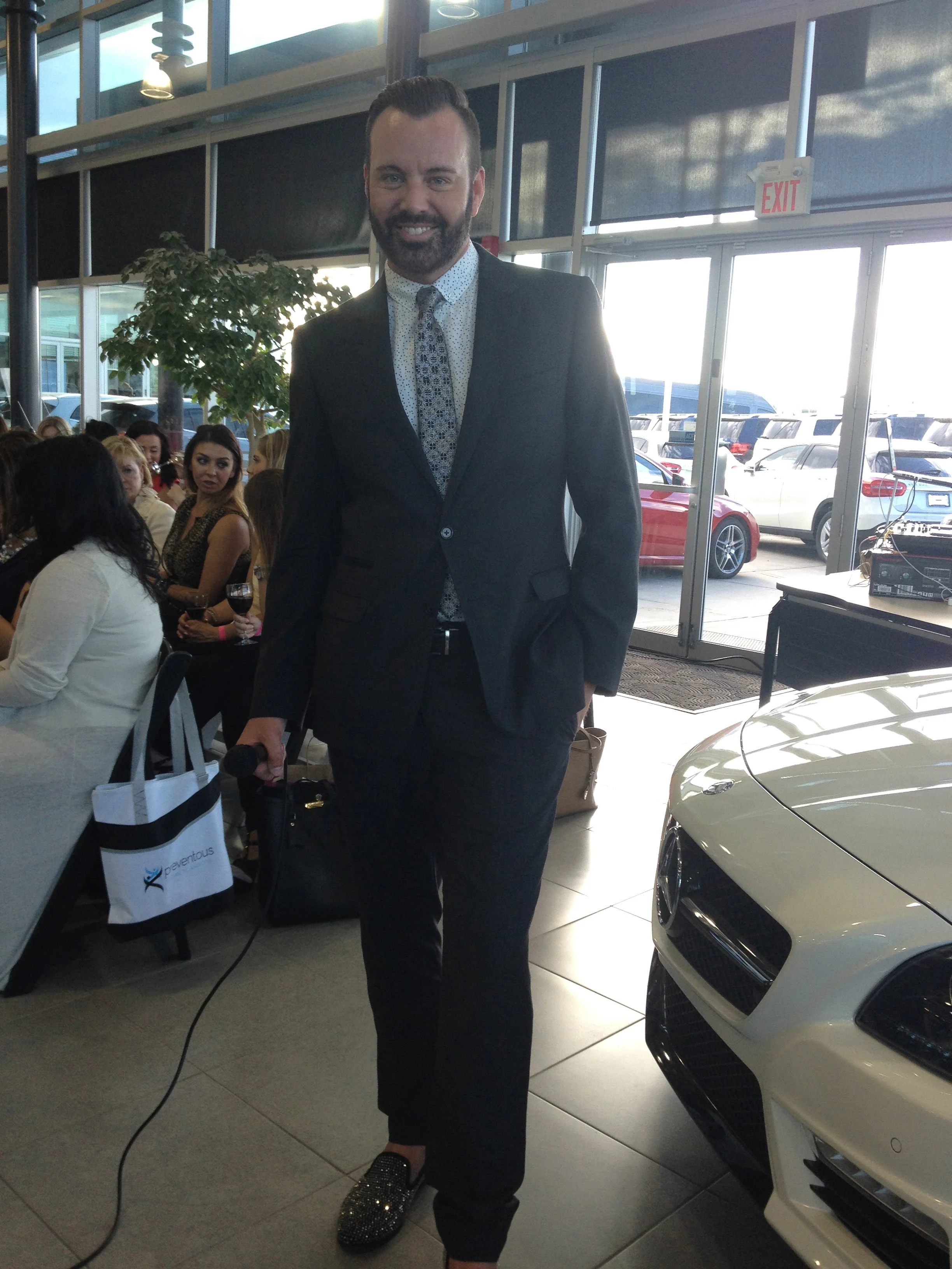 Quick, before he was back on camera, a shot of the handsome Jason Krell - and his deliciously sparkly shoes :)