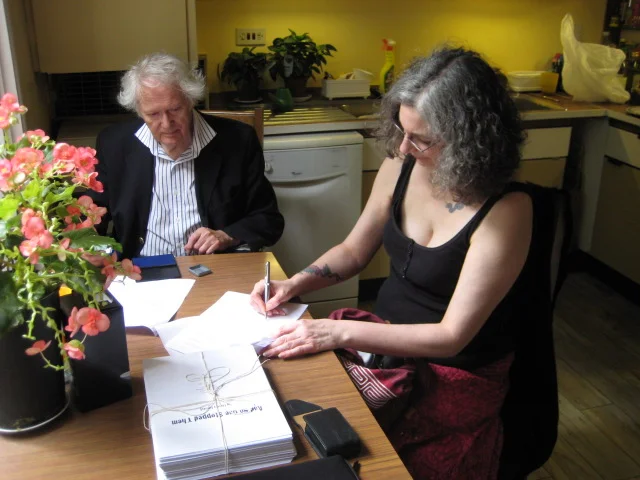 Signing the contract with Peter Knight, of Knight Features Literary Agency, London, England. Not pictured but nearby, Liberty's lovely agent, Samantha Ferris, who handles their non-fiction books.
