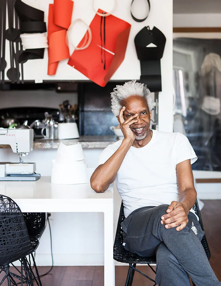  Graphic designer and paper sculptor, Gregory Gray, in his apartment and studio. 