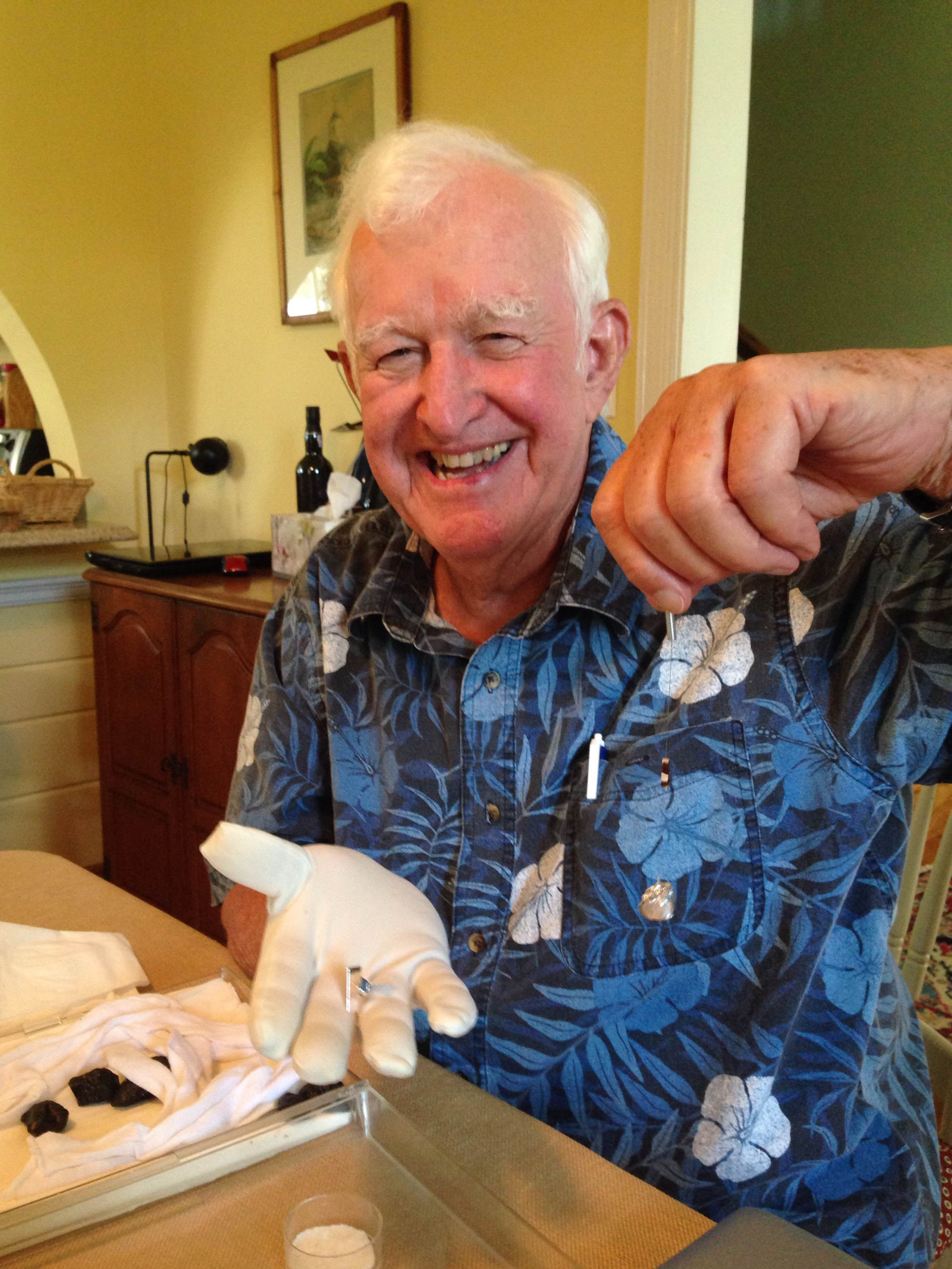 Dr Paddack, one of the discoverers of the YORP effect , tells some funny stories from his time at NASA. Here he shows an element from his famous experiment; a simplified spacecraft model with uniform color. When placed in a vacuum attached to a friction-less bearing, this element started spinning when a light was shone on it.