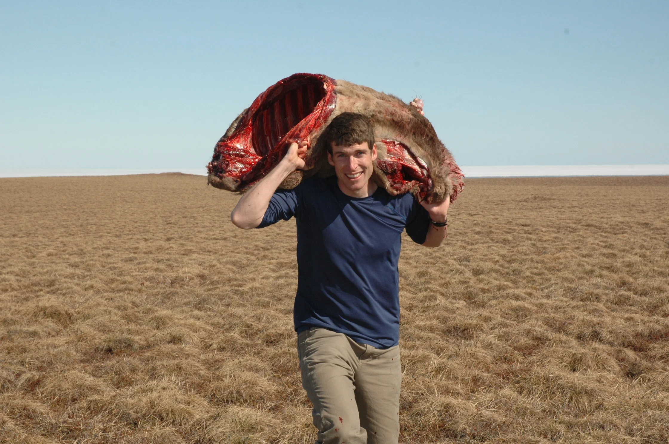7. Andrew carries out caribou 2.jpg