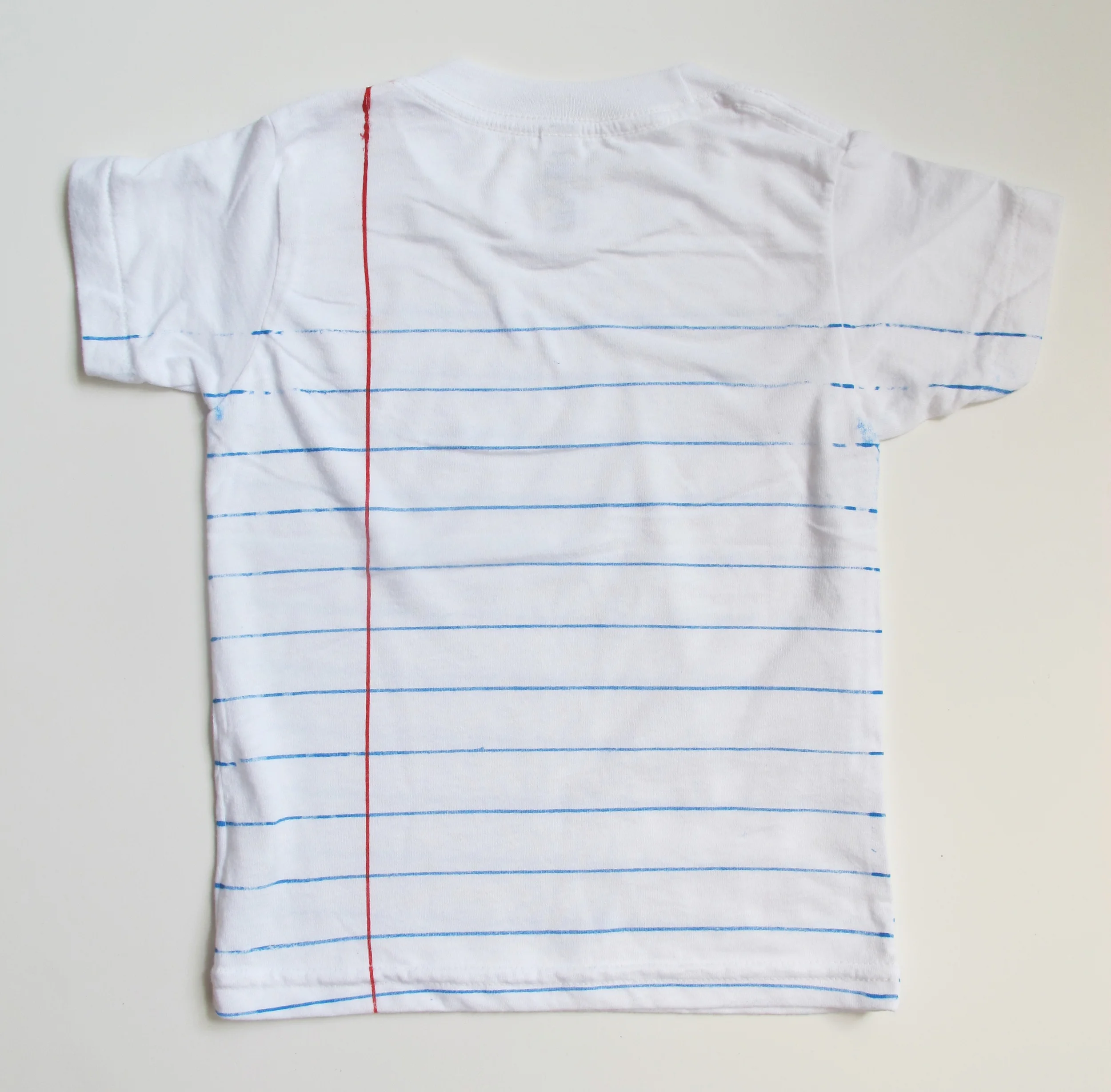 kidslooseleaftee2Tflatback.jpg