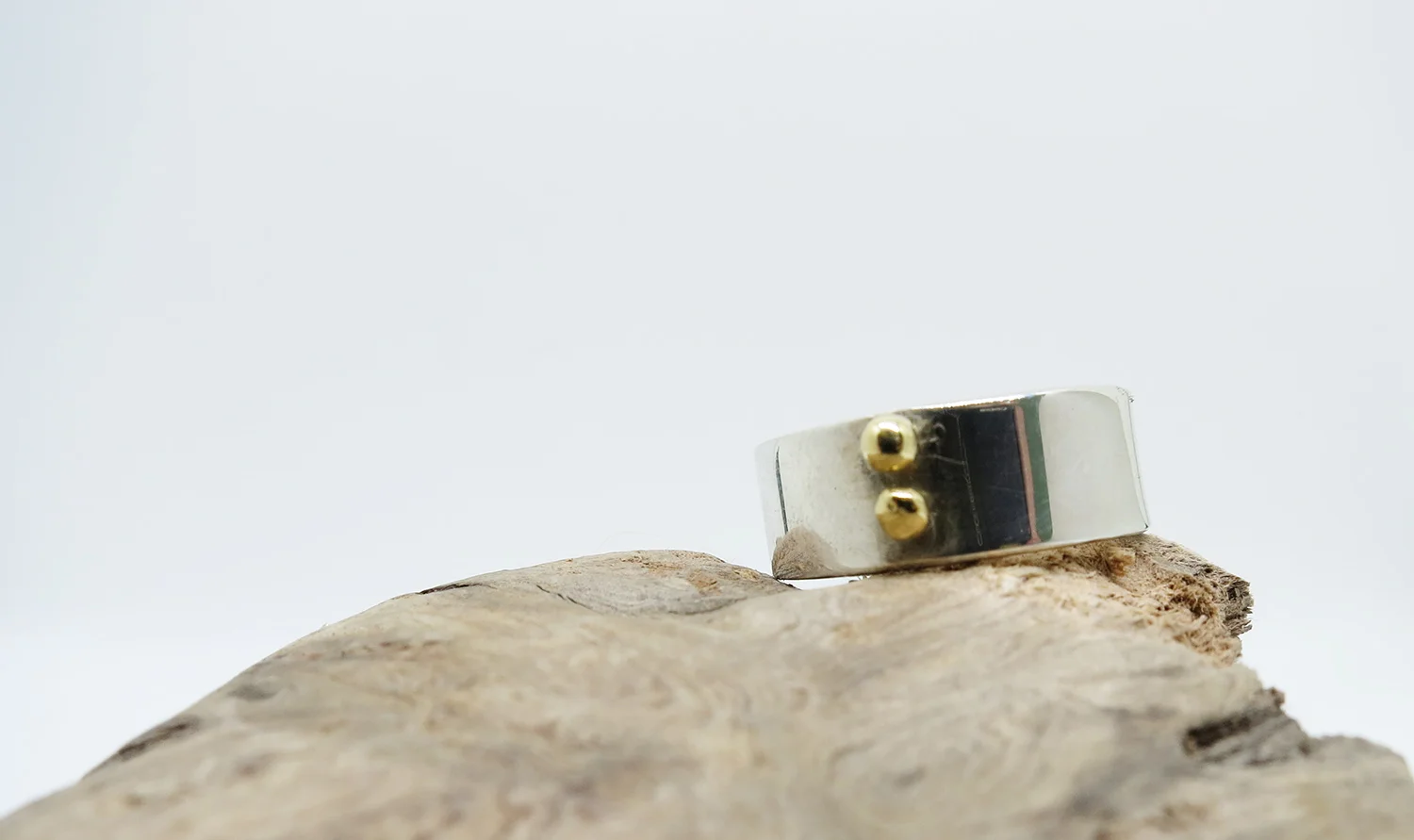 gold ball solitaire THICK on wood 2.jpg