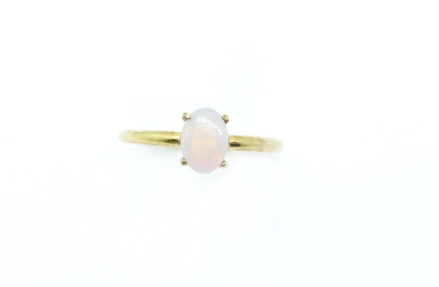 milky opal yellow gold solitaire.jpg