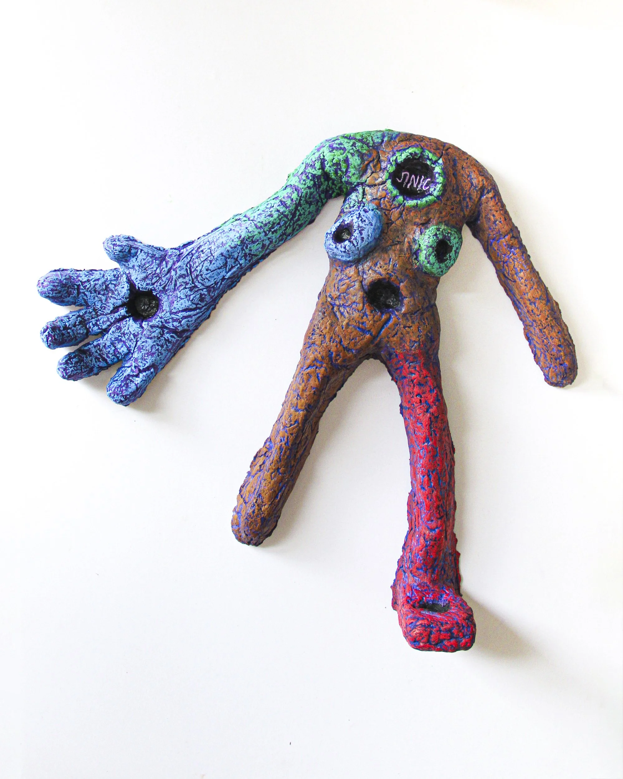 Exhausted Golem ג (Self Portrait), 2025 Paper, clay, watercolour, and wax pastel. 17 × 23 × 5 cm. Shown with Exhausted Golem ד (Self Portrait), 2025.