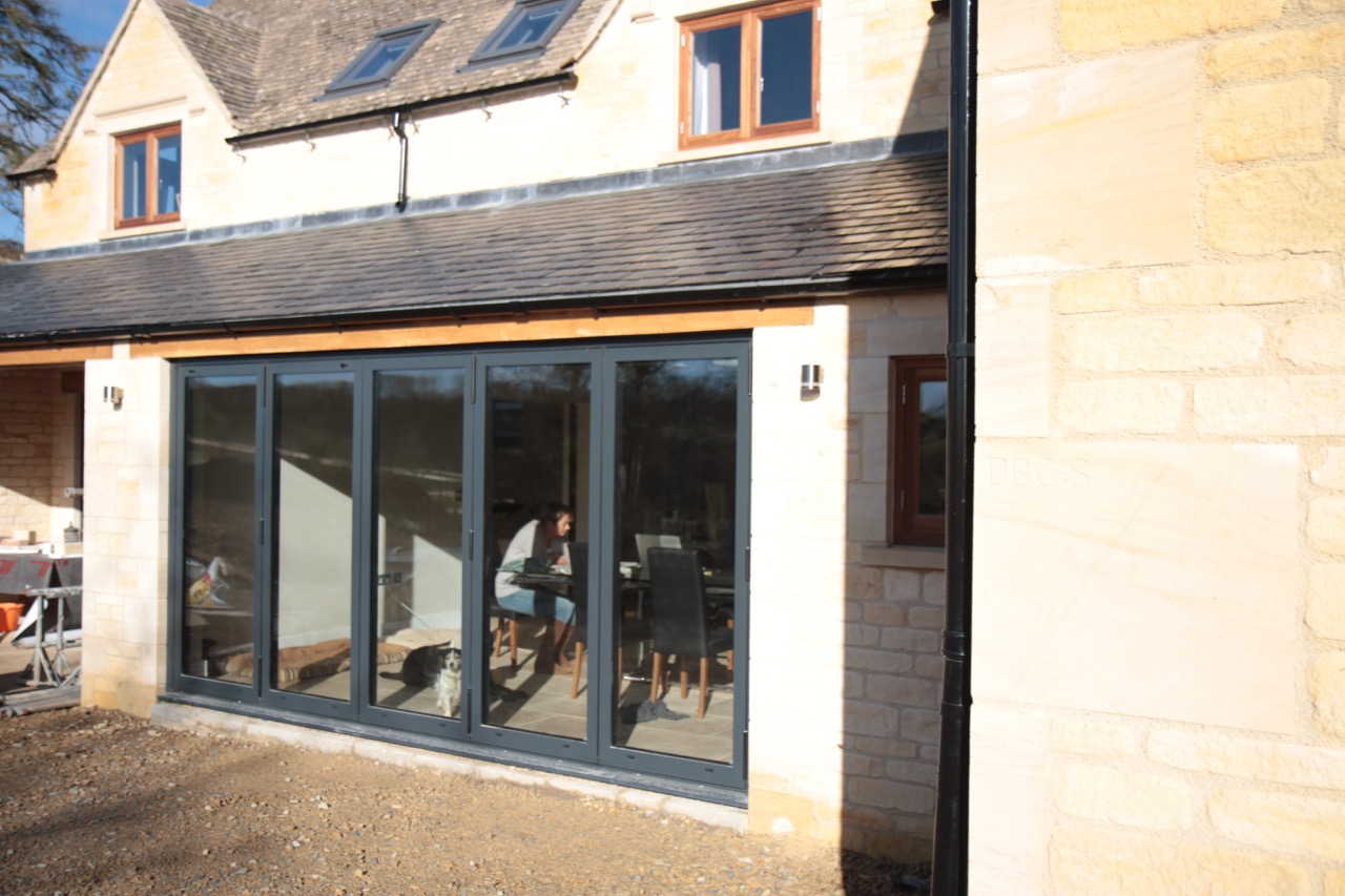  Treble glazed folding sliding doors 