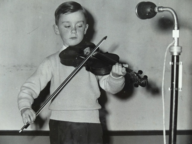 An 8 year-old Seamus McGuire performing at a Gael-Linn concert in Tullamore, Co Offally