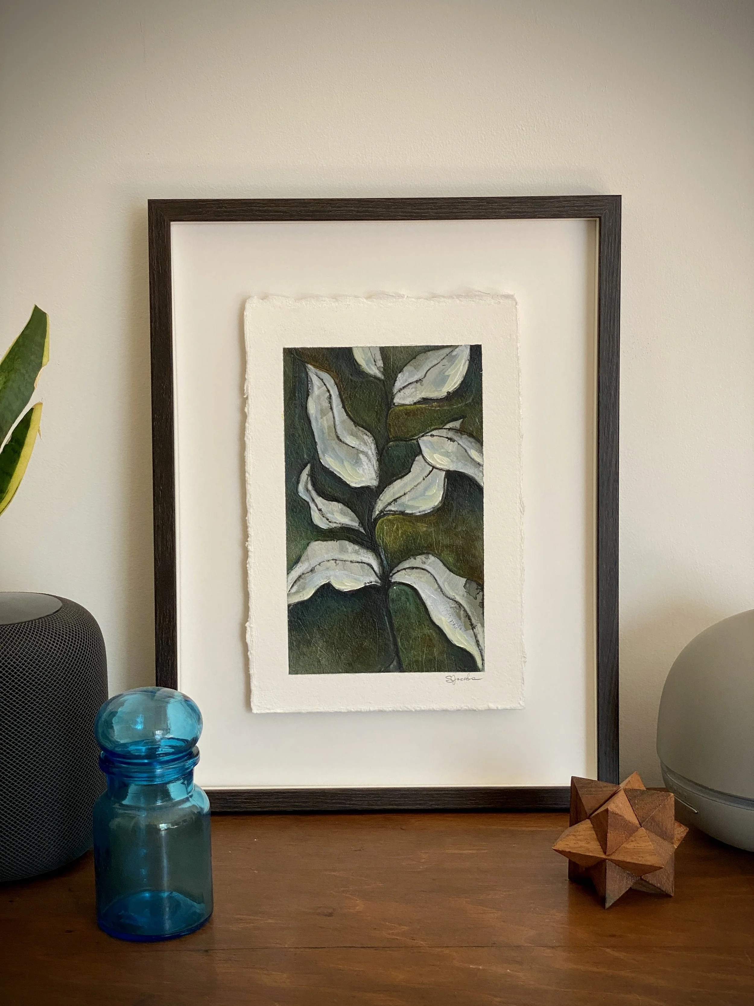 GreenLeavesOnPaper_FOnDesk_ShelleyJacobsNov2021.JPG