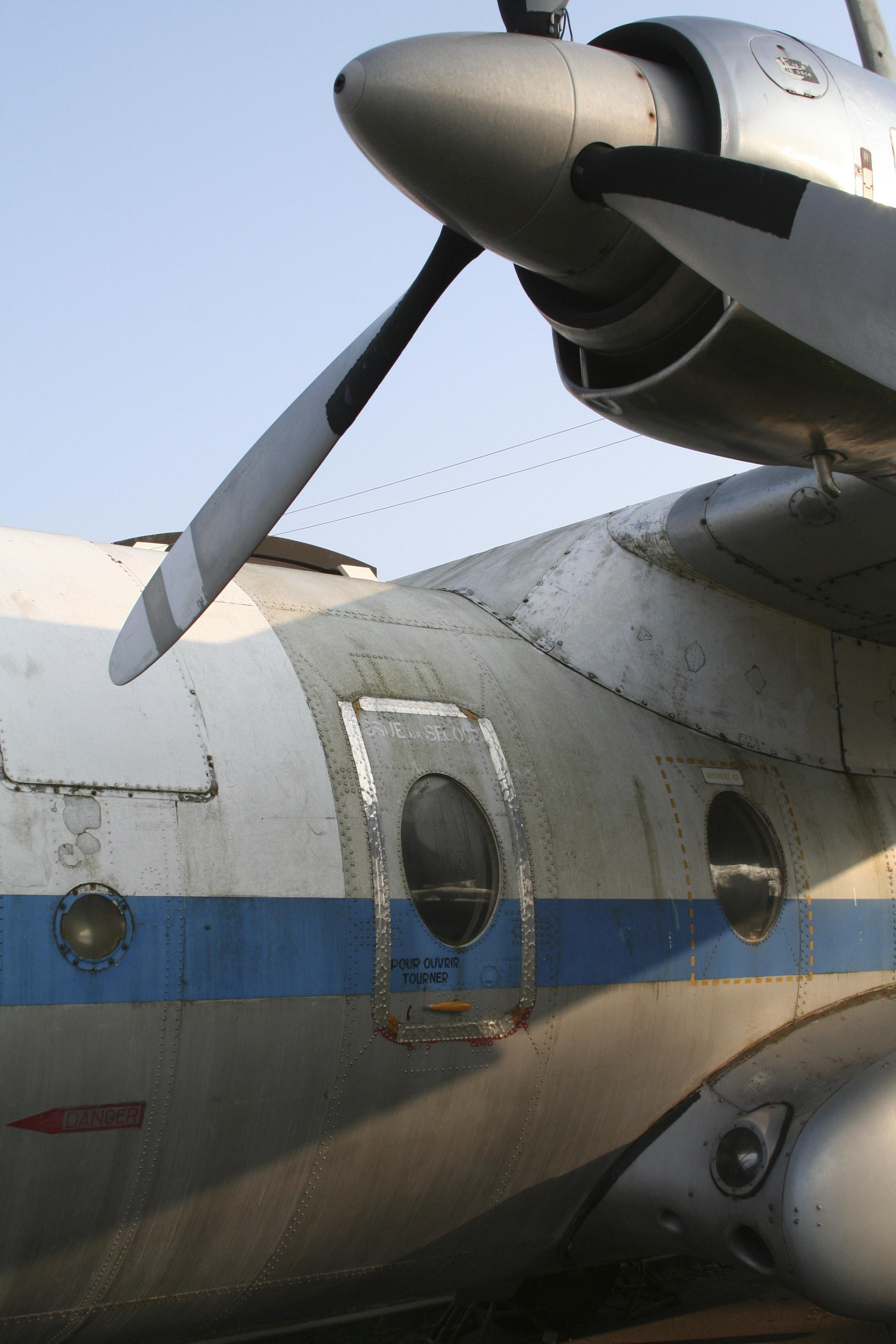 Photo by sylv1rob1/iStock / Getty Images This is the best photo because you can actually see where I sat! It even has a "frame" around it! Although this is not the plane it looks very much like it. My window looked out to the propeller and I thought of my brother and his model airplane collection - many of which hung from his bedroom ceiling. We loved to visit the airport to watch planes coming and going...