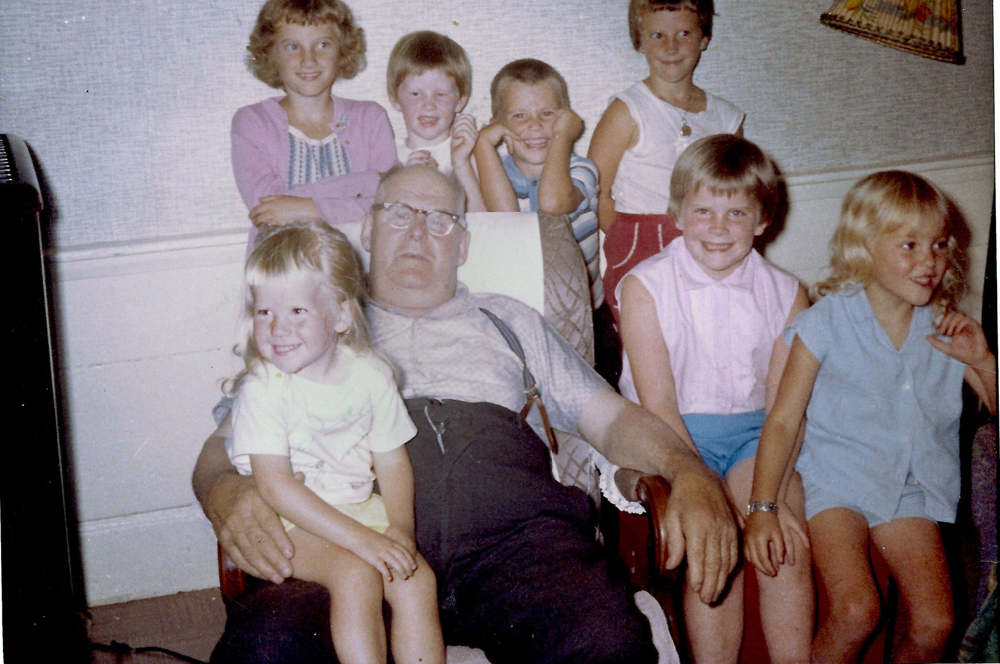 Just a few of my cousins, with yours truly on Grampy's lap. At any given time, there were hordes of us running around in and around the house. The only time we stopped was to eat. I'm not sure hands got washed first though.