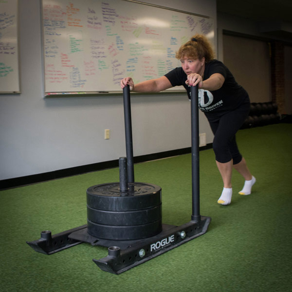 Jennifer practicing a new exercise