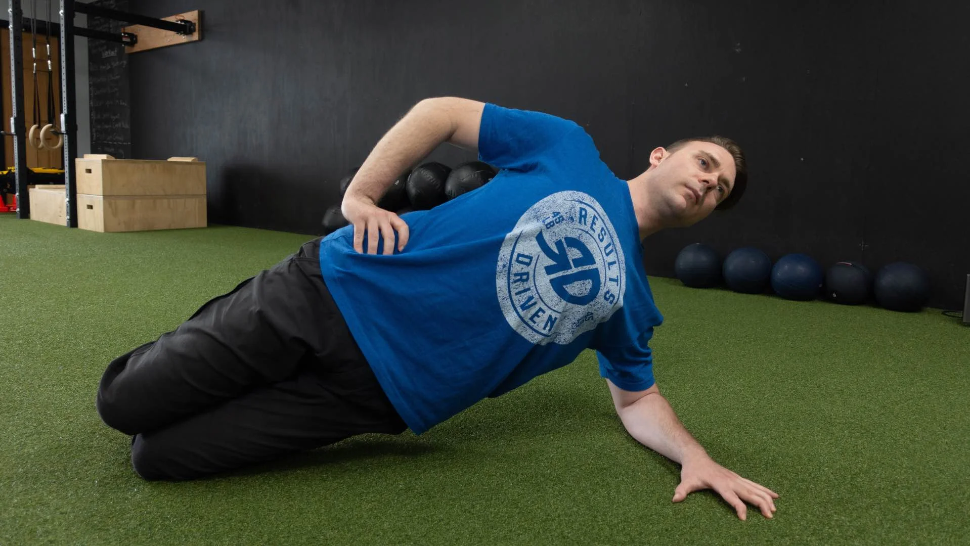 Coach Mike Side Plank 16x9_Fotor.jpg