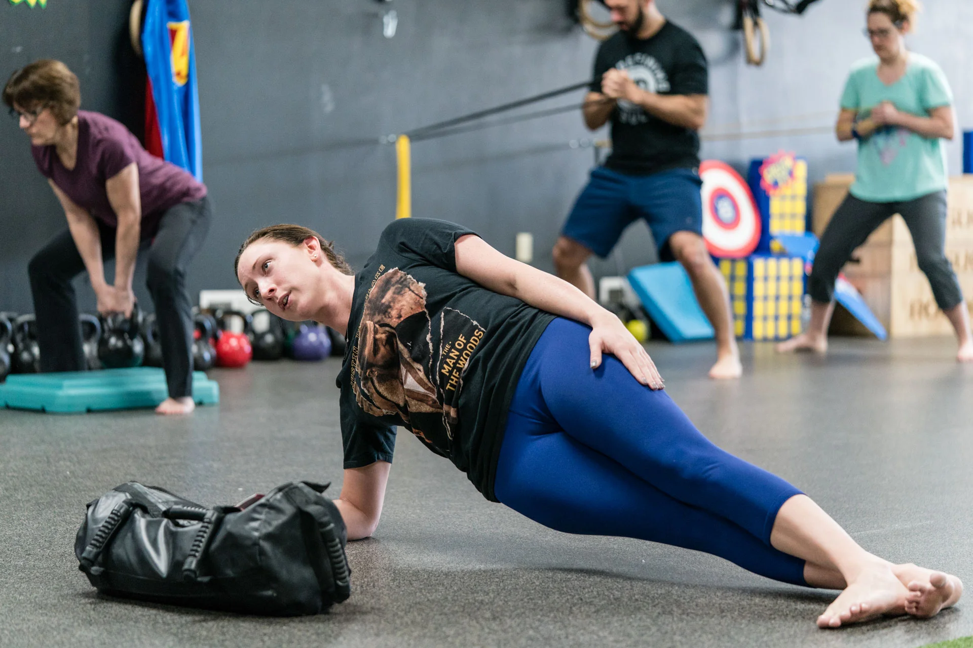 bri side plank deadlift ar press background 3x2.jpg