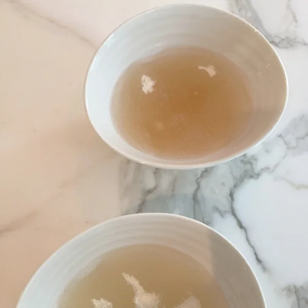 Powdered gelatin hydrating in water (actually booze)!