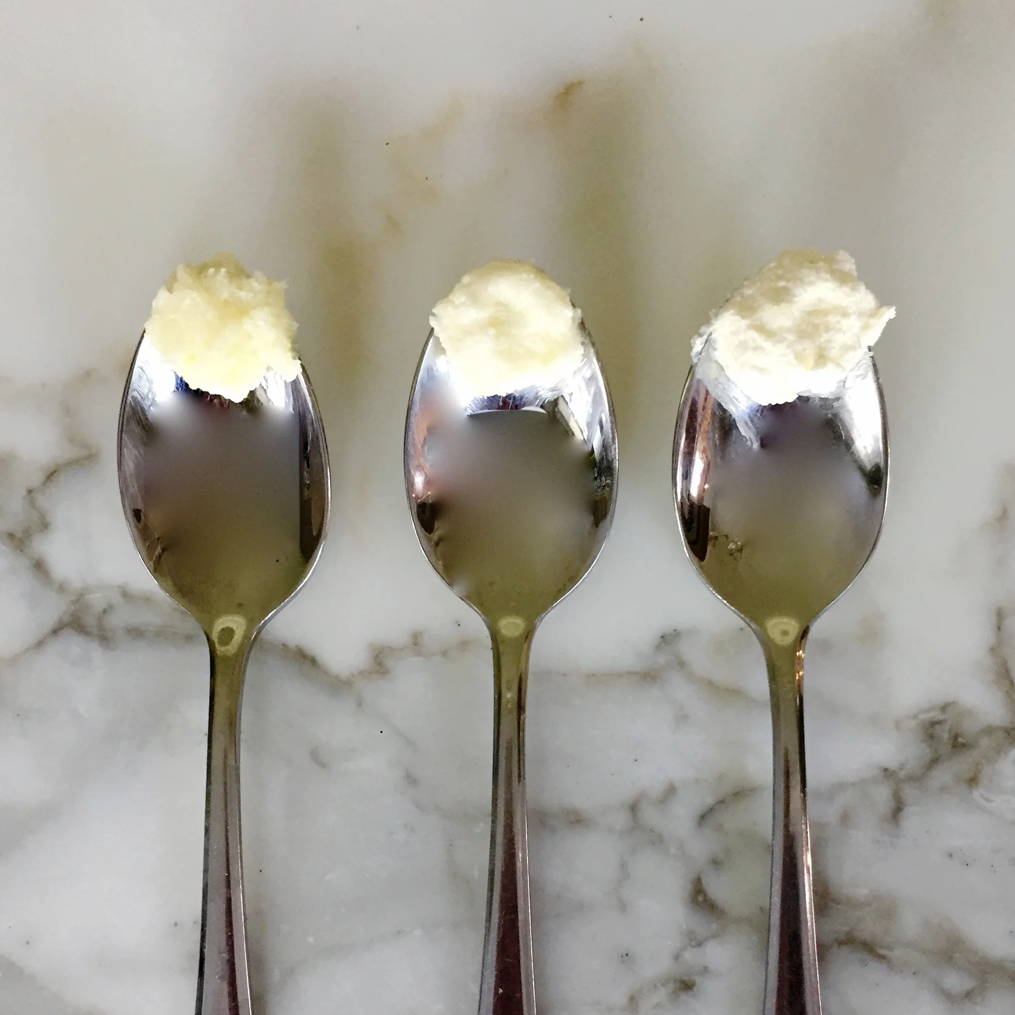 On the left, butter & sugar just mixed together. In the middle partially creamed butter (notice colour is lighter, but mixture is still dense). On the right, properly creamed butter & sugar (notice the light colour and increased volume).