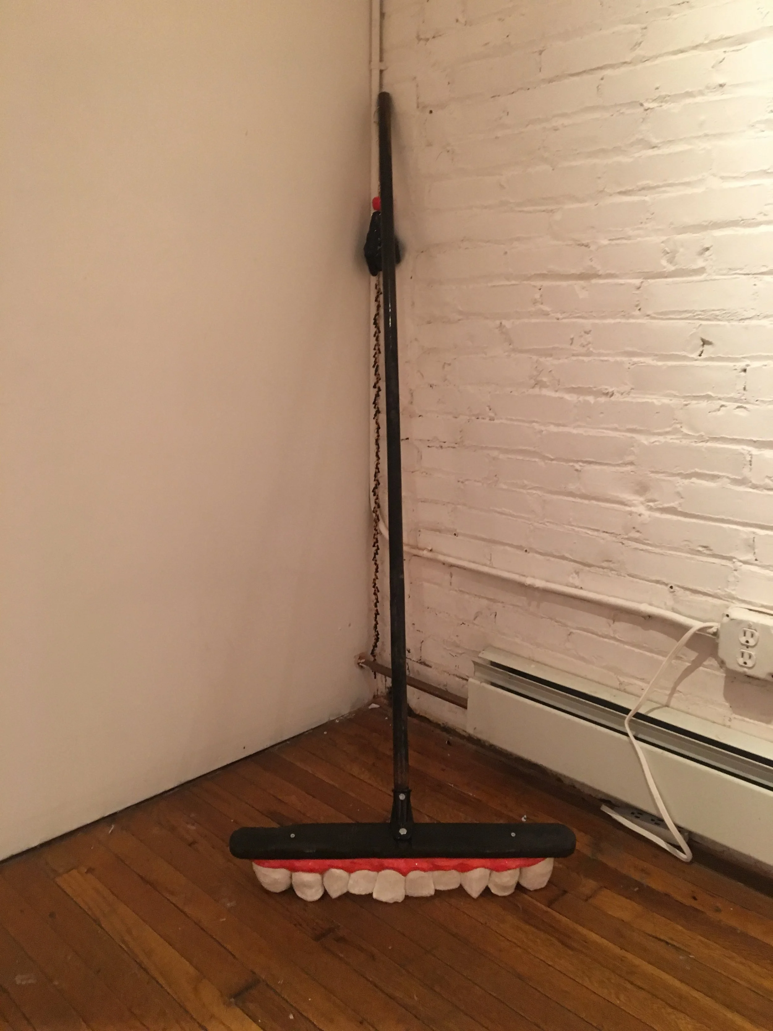  Pheonix (Calling on the Spirit of the Garbage Offensive)  Shellyne Rodriguez  Assemblage  2015  4.5 x 2 x 3’.     The broom is reminiscent of a past of movements and social uproar that pushed young and old from the east harlem hoods to rede ne thems