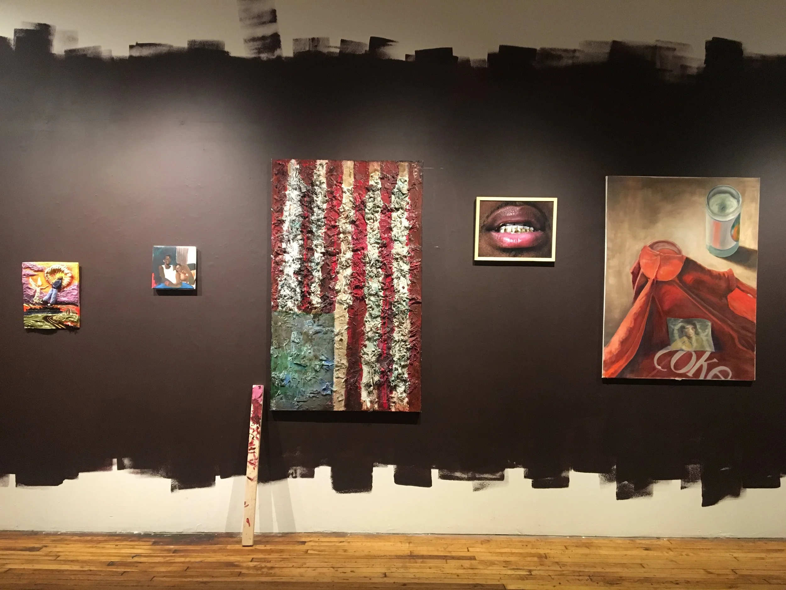  (Left to Right)  Mirage II  Shellyne Rodriguez  Ceramic  2016  13x15”     The Lovers  Cheyenne Julien  acrylic on stretched paper  2014  10x10”     Last, one home  Anthony J. Thomas  Mixed Media on Canvas.  (Denim, Glass, Newspaper, Rubber reclaimed