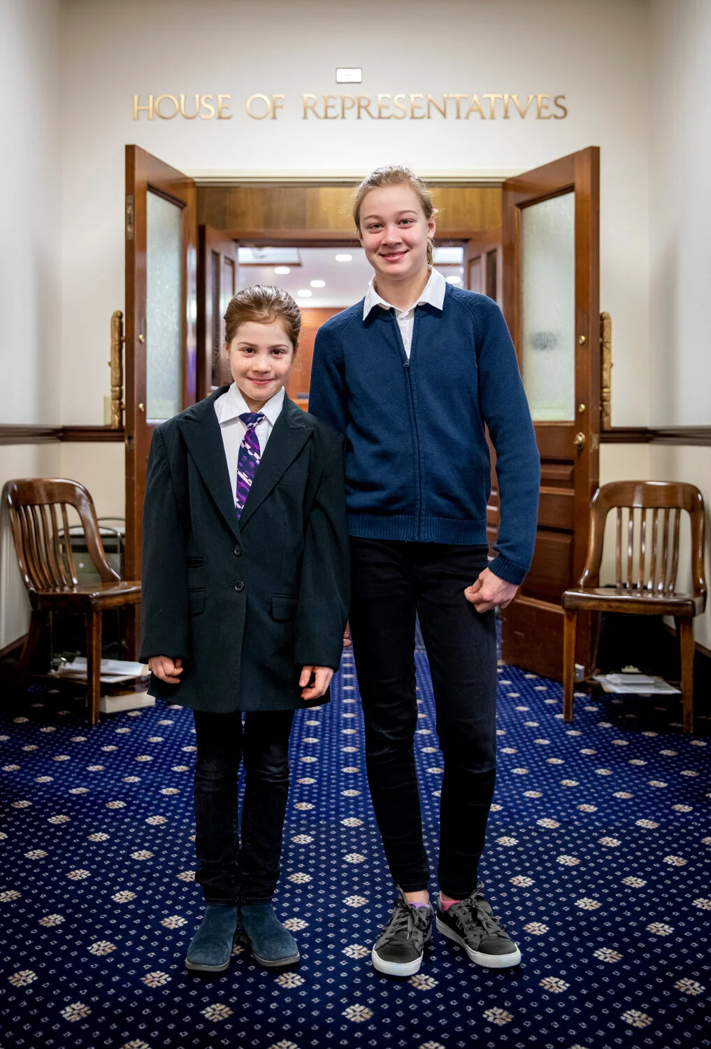 Abby (left) and Evelyn Wool, Guest Pages, outside the House of Representatives, 2nd floor, the capitol , Juneau