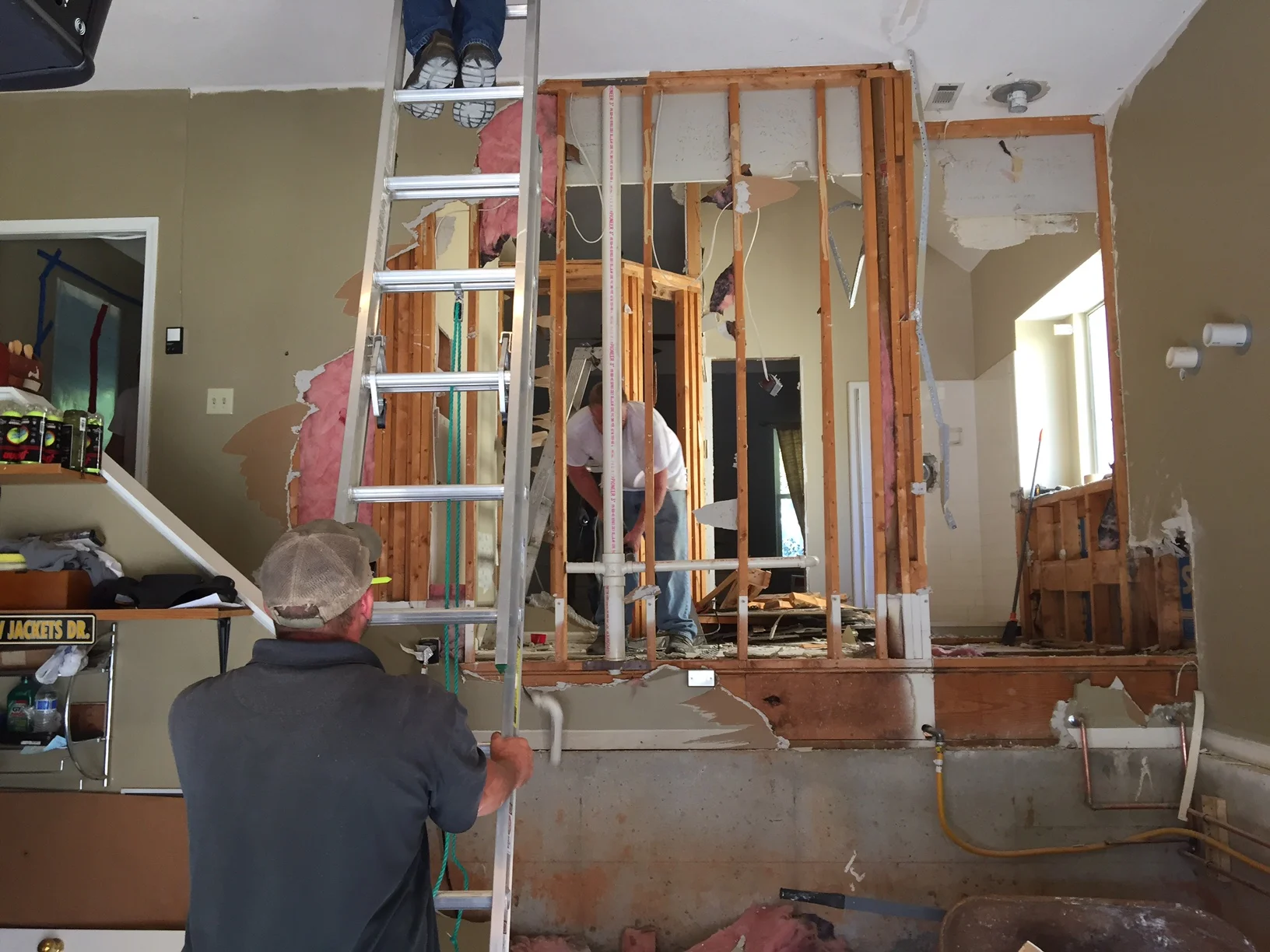 DEMOLITION - And now for the exciting stuff -- sledgehammers and careful demolition of existing walls. 