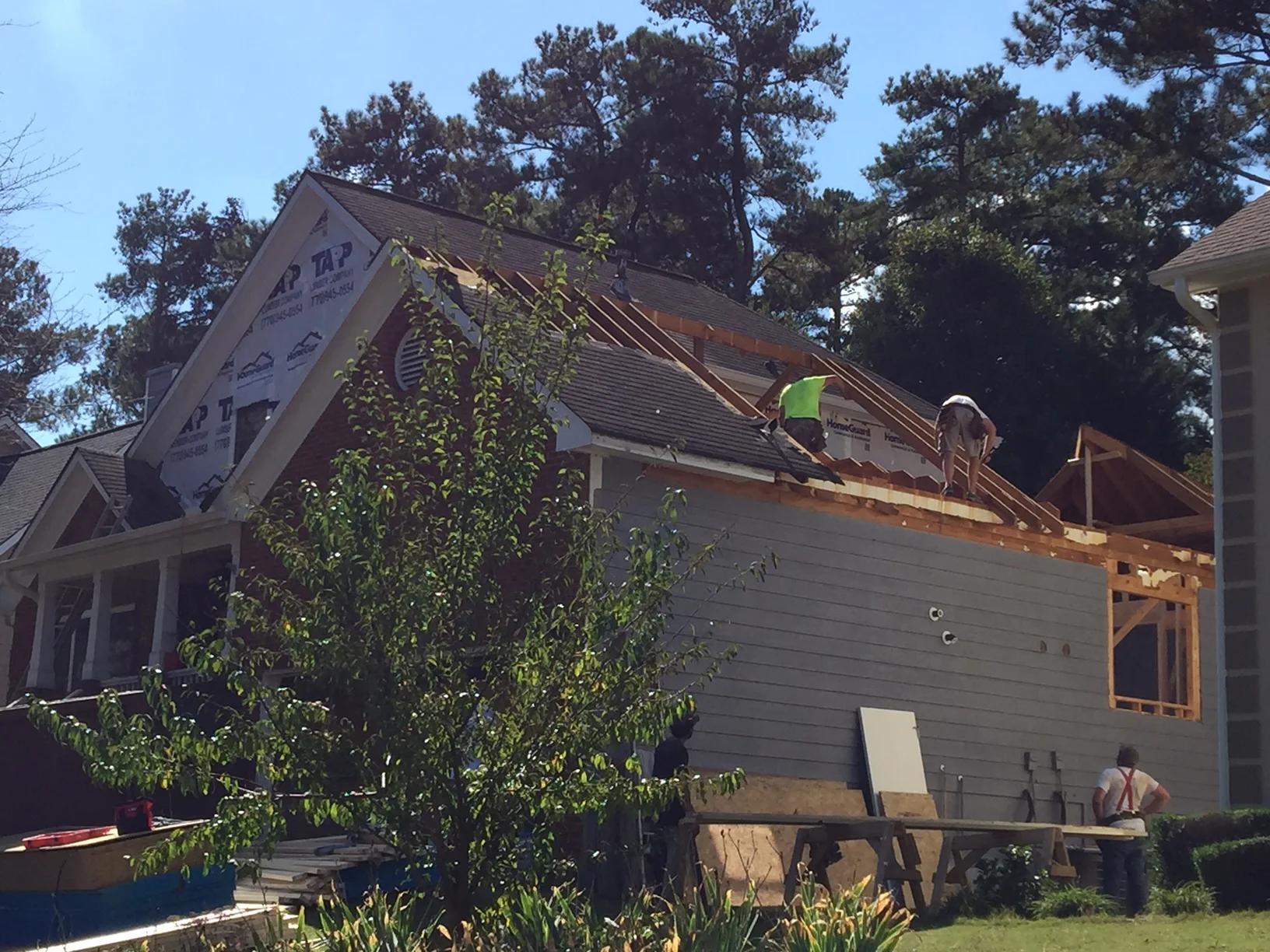 DEMOLITION - Removing the roof materials in preparation for the second story addition