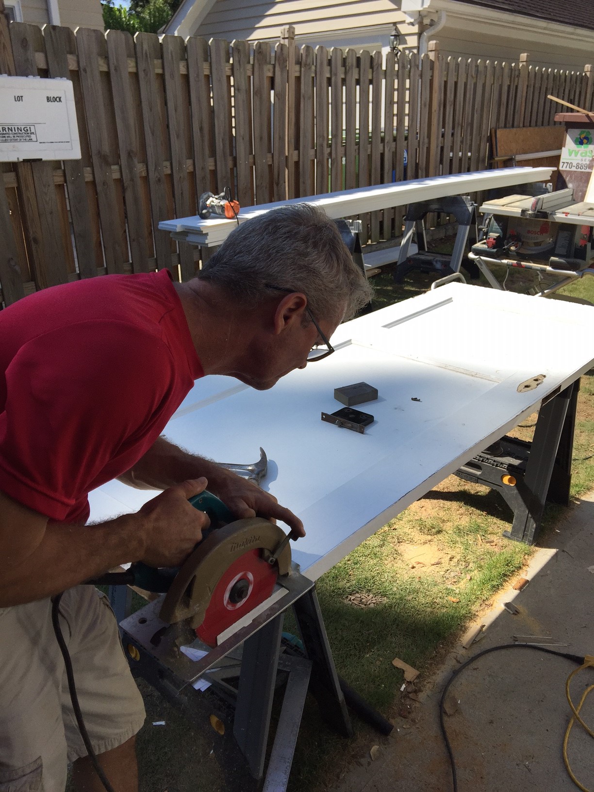 Ian working on Upcycling these 1930's doors - more here