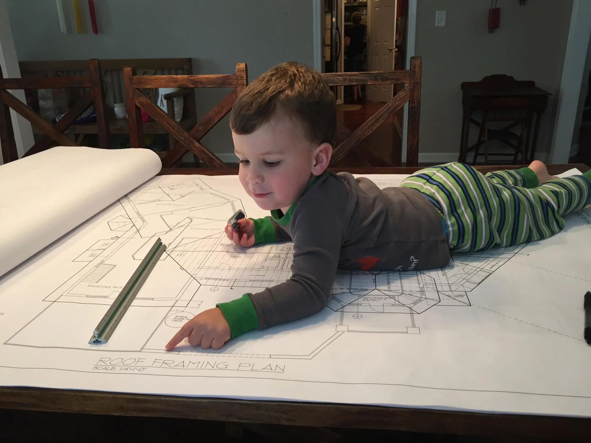 Ben's son giving him a little "assistance" in the family business. 