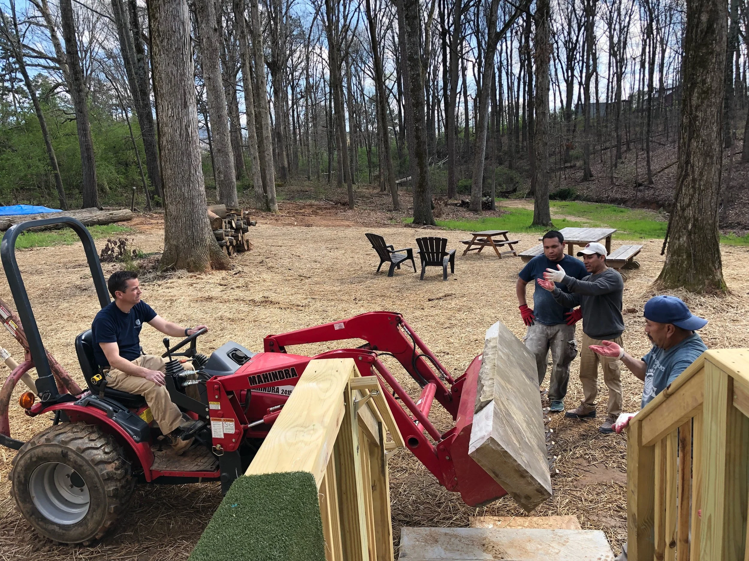 Ben used a friend's tractor to give it a doorstep delivery, but unfortunately, the stone still needed to move up a few steps and through a hallway and kitchen to get to its final resting place.