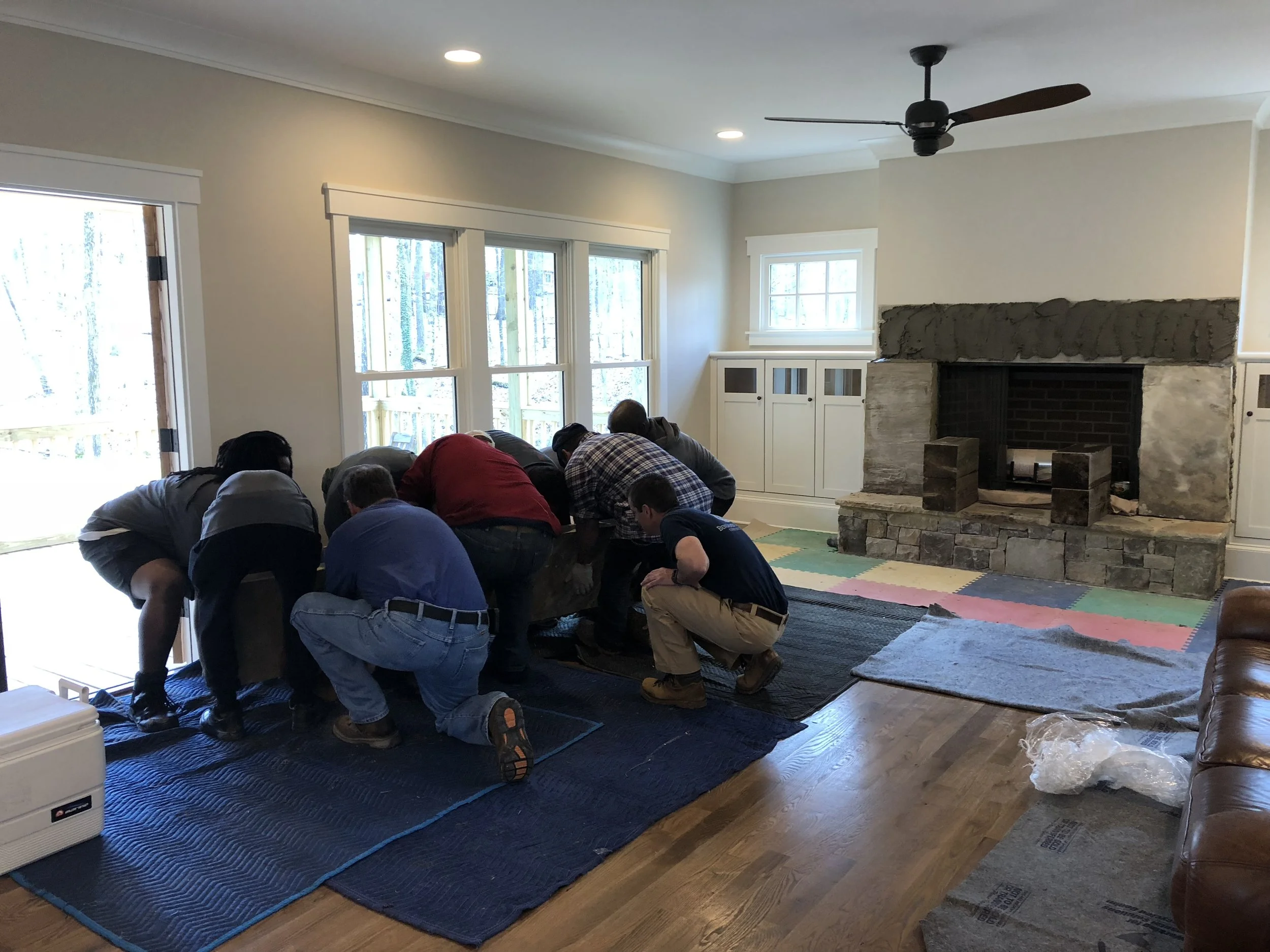 And again, nine men working together to get the lintel in place.