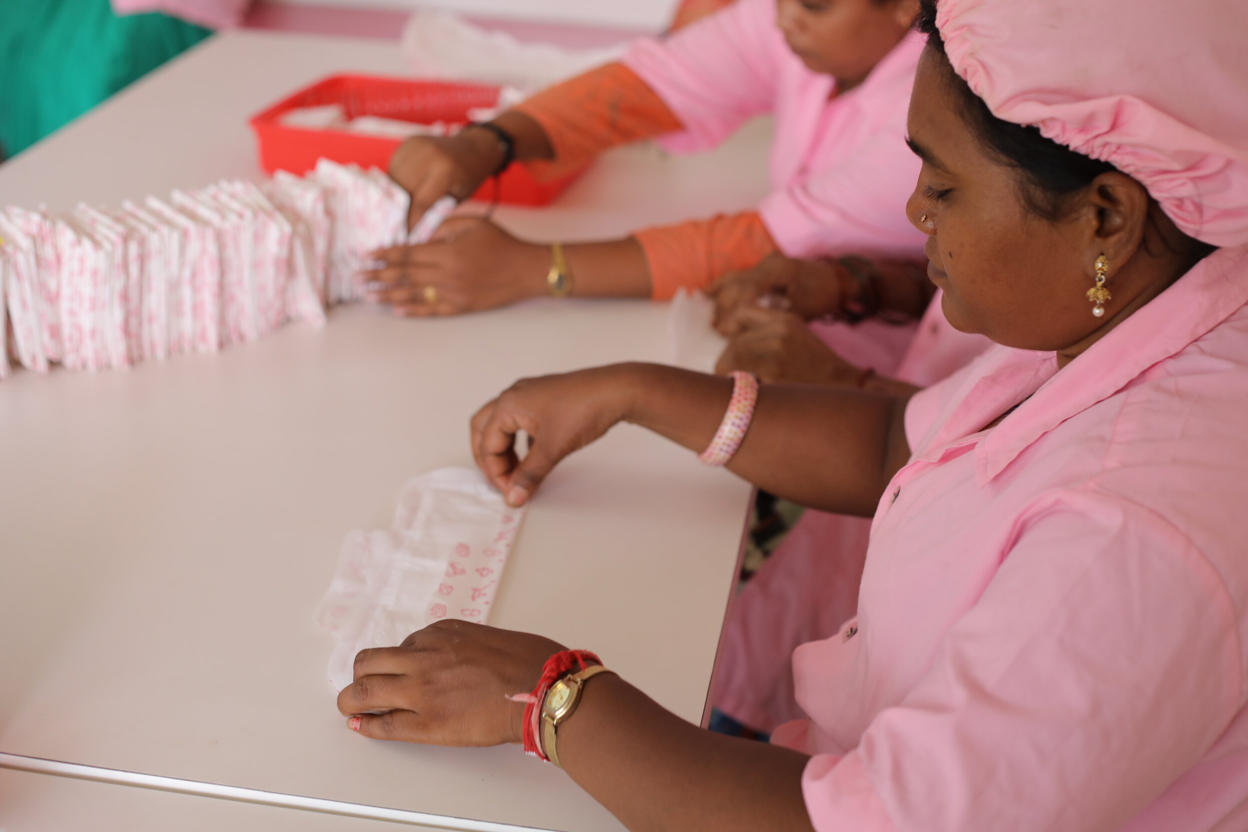 Women assembling Asani sanitary napkins (5).JPG