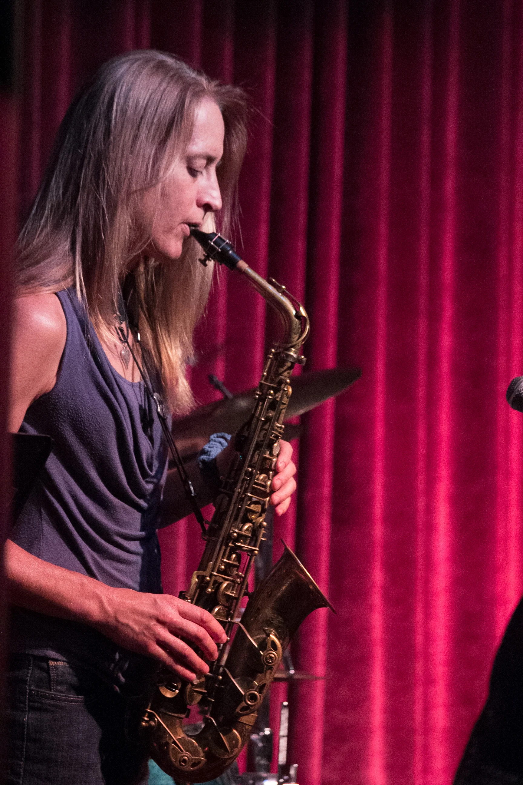 Esther's Muse presents a chord-less trio including Esther Berndt on saxophone, Kevin Murray on drums, and Kazuto Sato on bass. The trio will perform a combination of jazz standards and avant-garde improvisation, inspired by the late great Ornette Coleman.