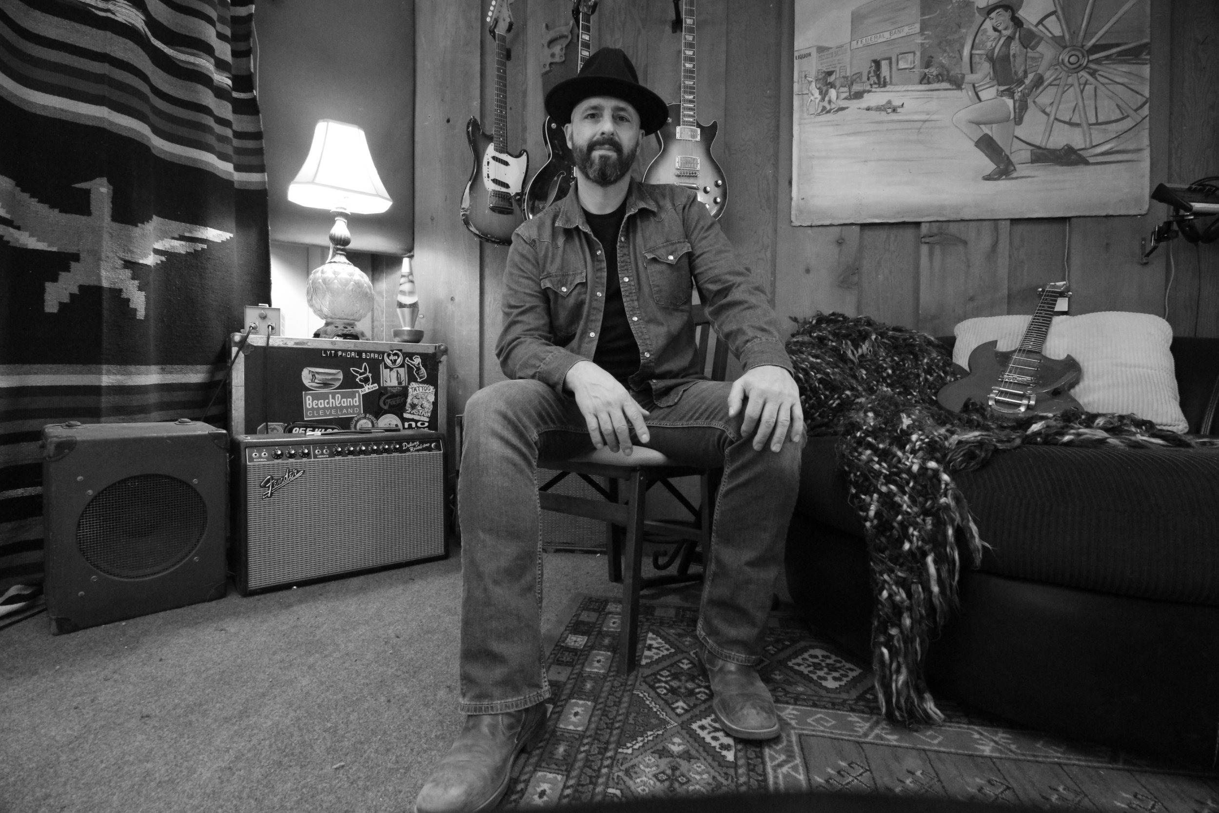 Americana singer-songwriter Rick Shelley began playing and writing music as a teenager. Throughout his 20s and 30s he was a part of two moderately successful bands, RagTag in Los Angeles and Woodshed in the Coachella Valley. During the RagTag, years, he was the charismatic frontman, reinforced by guitarist James Danielson, drummer Eric Turner and bassist Nick Oliveri. Their sound comfortably sandwiched between the gritty Glam-Metal of Guns N’ Roses and the serpentine Punk of Jane’s Addiction.