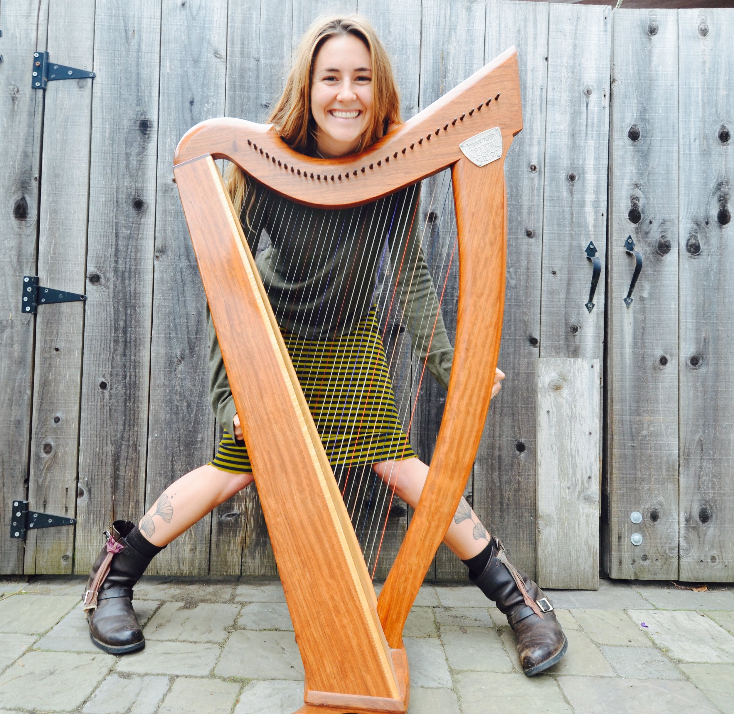 Ella Dawn Jenkins: After 4 years studying traditional Scottish music and the Gaelic language in Glasgow Scotland, Ella Dawn Jenkins is a Bay Area based harpist and songwriter of blues, folk and pop influence. (photo: green dress)