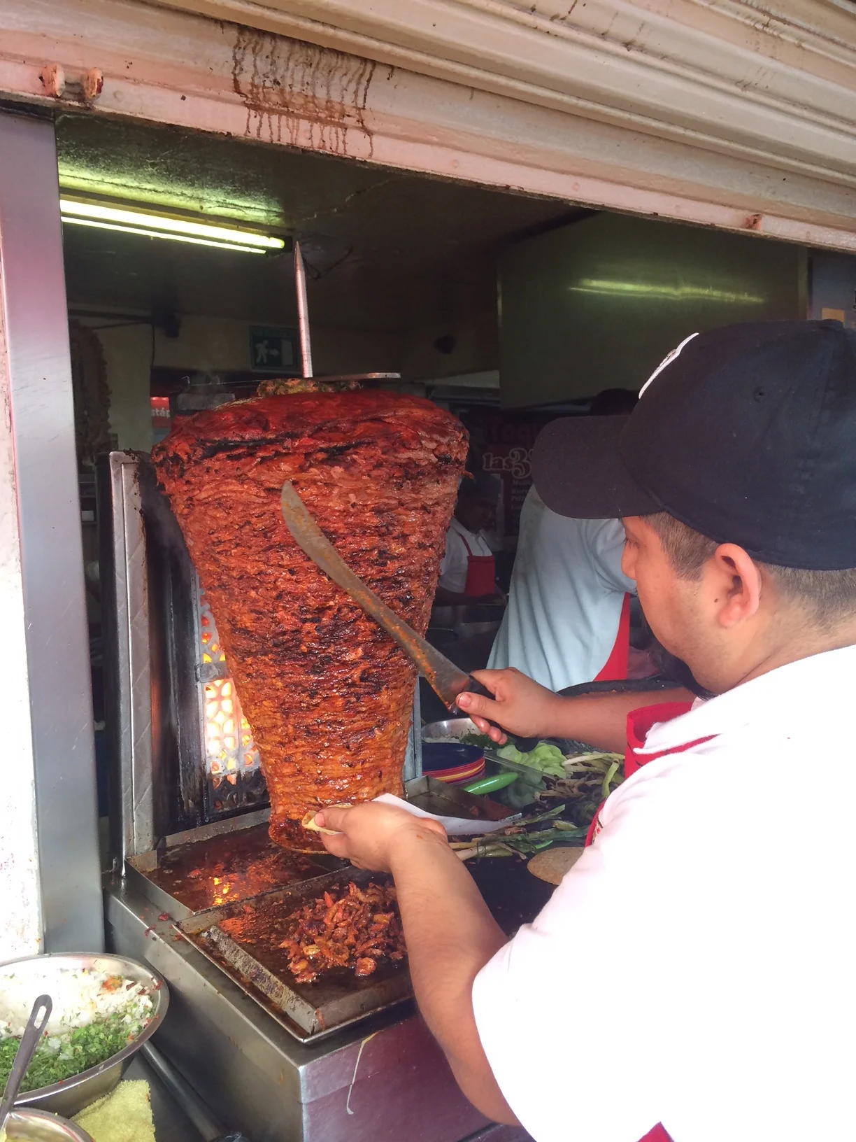 Carving_Al_Pastor_Tacos.JPG