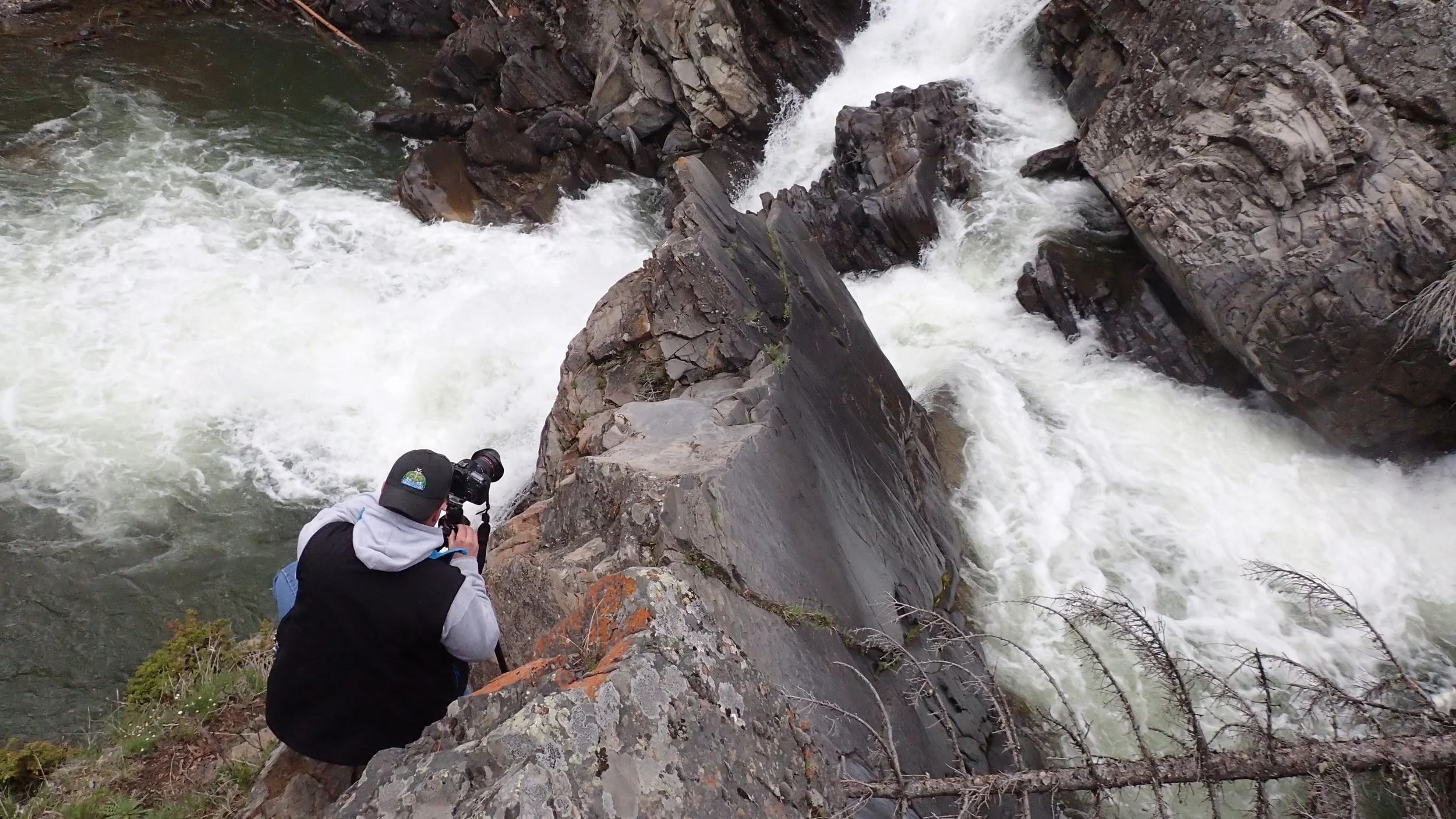 Thomas soaks in the powerful presence of Oldman River Falls.