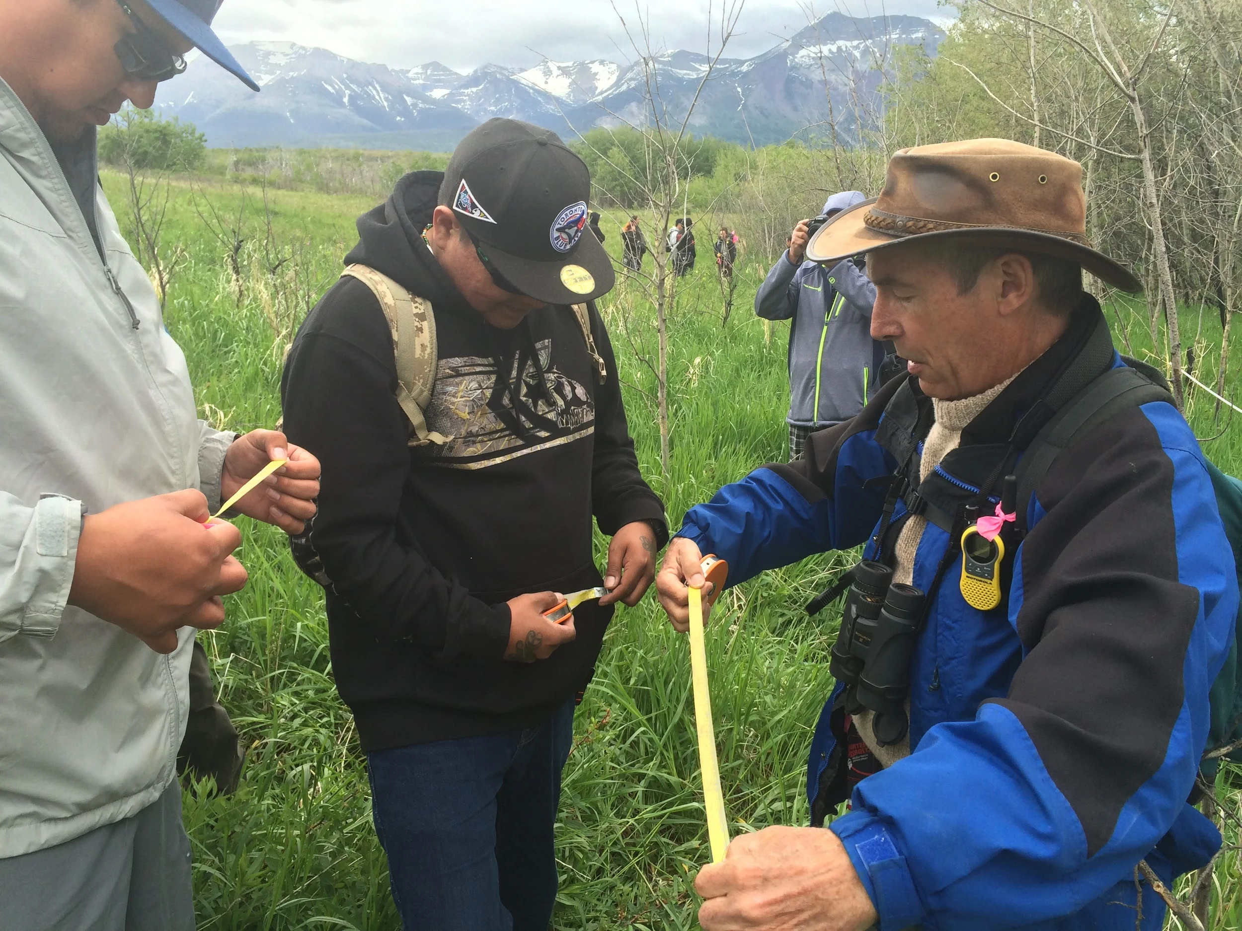 Dave of the Earthwatch Institute demonstrating how to take tree diameter measurements