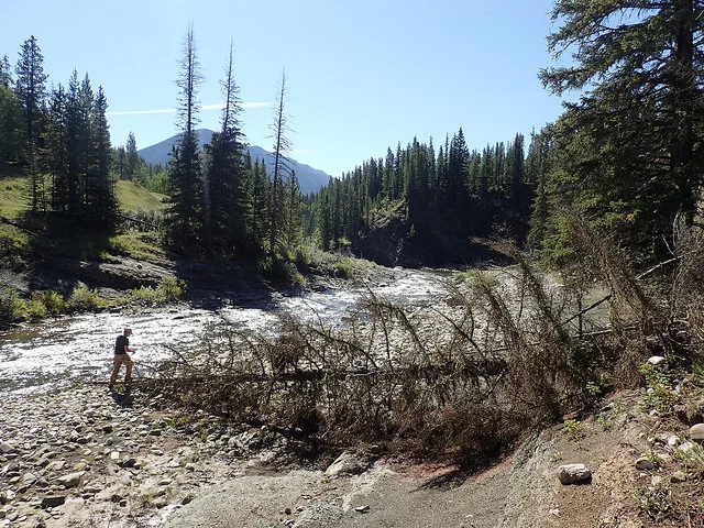 The Livingstone River area was one of the places OWC's Outreach Assistants, including Rob Taylor pictured here, spent time this summer talking to recreationists about watershed health. 
