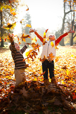 42498-Kids-Playing-In-Leaves.jpg