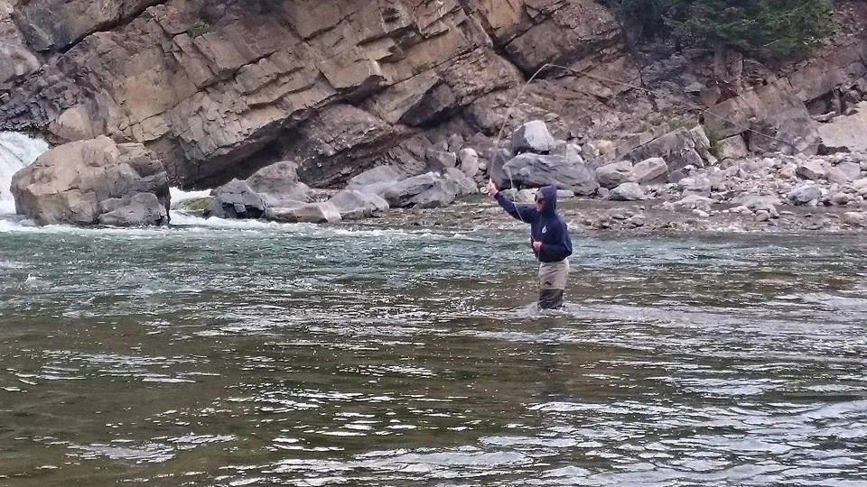Fly fishing in the Upper Oldman. Photo by Jordan Pinkster. 