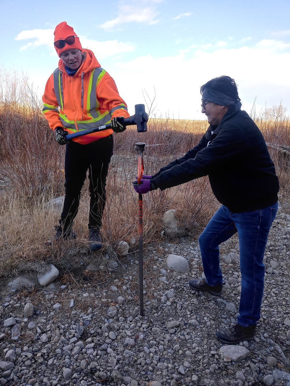 Shannon and Noreen staking willows along Crowlodge Creek by OWC.jpg