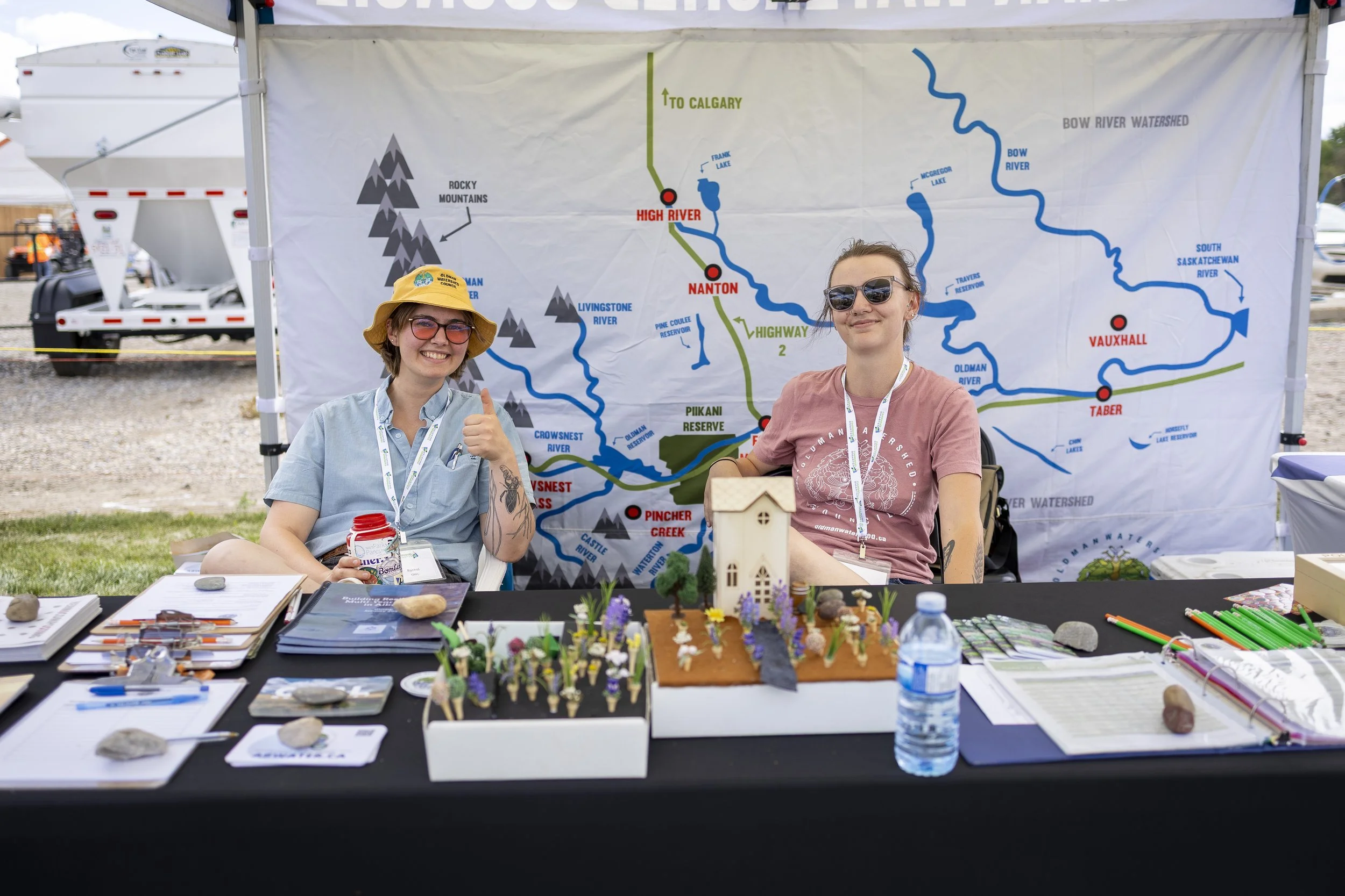  Chantel and me at Open Farm Days, August 2025, in Lethbridge. We had just built the build-your-own-garden activity you see on the table, which we dubbed ‘Little House on the Prairie”. You may also notice that every single piece of paper on this tabl