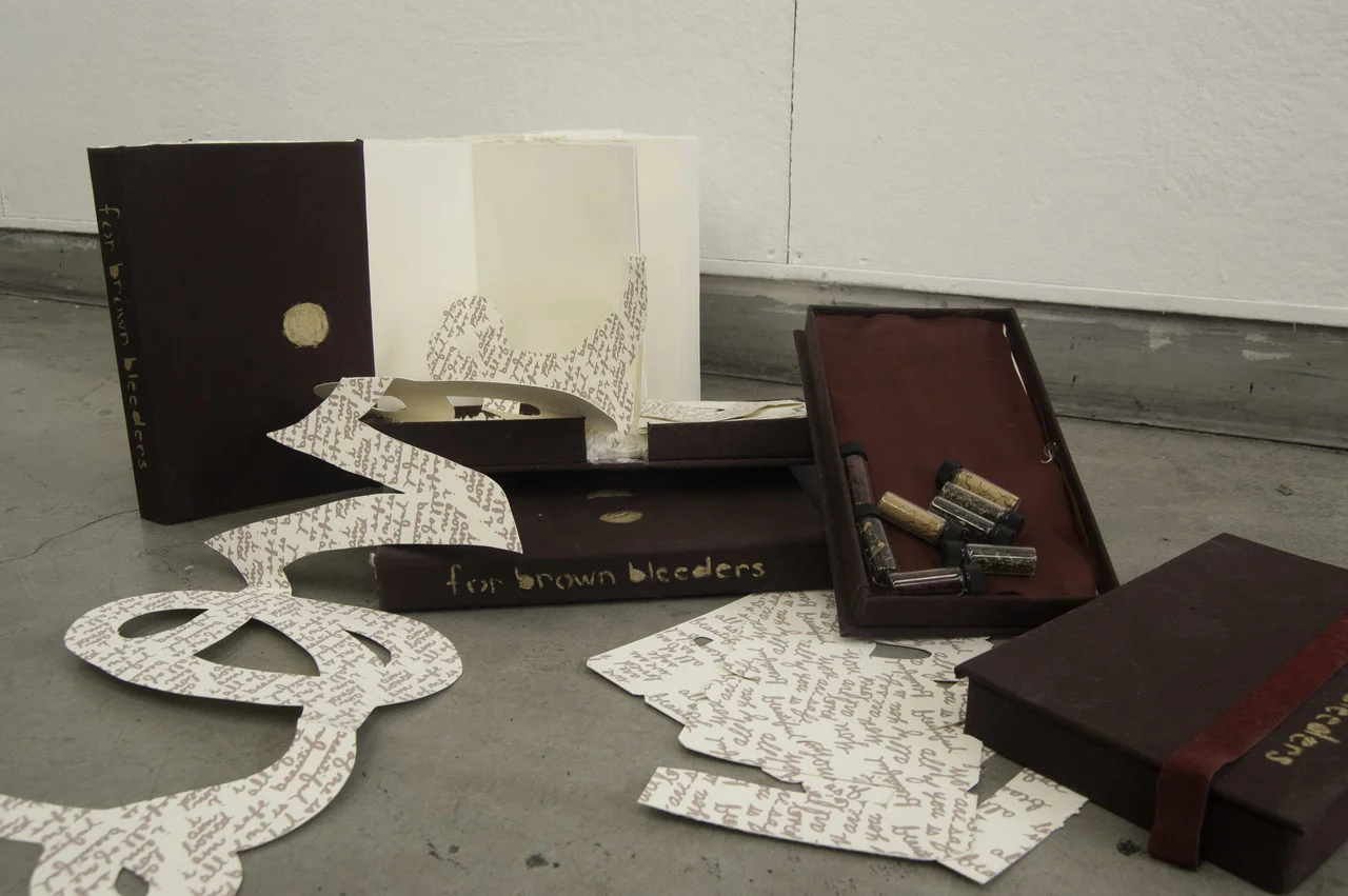 For Brown Bleeders handmade books, screenprints, vials of herbs, 1" x 5.5" x 9.5"