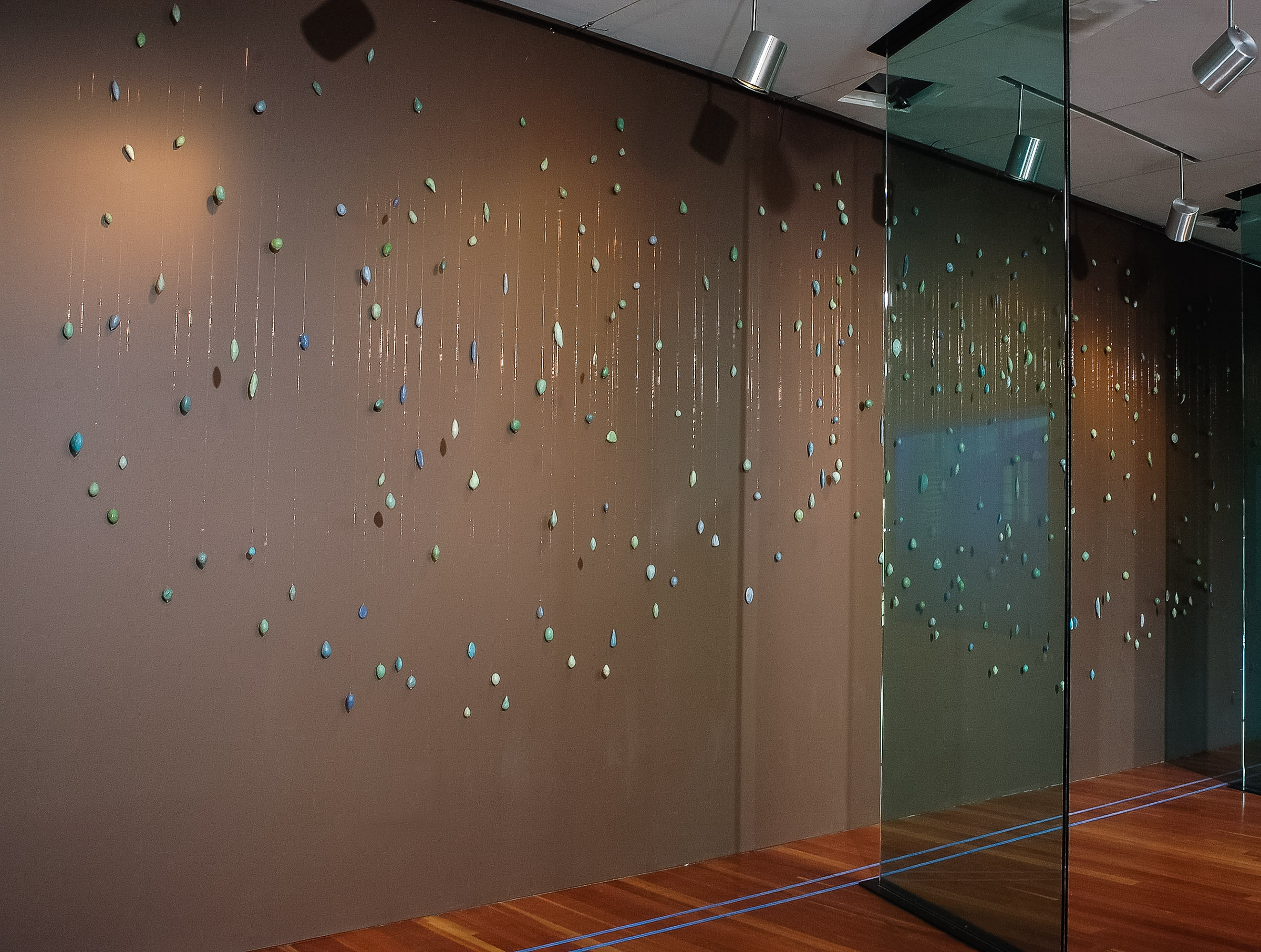 Rainfall Installation- 300 Paper Mache and beeswax forms, copper wire De Young Kimball Gallery 2009