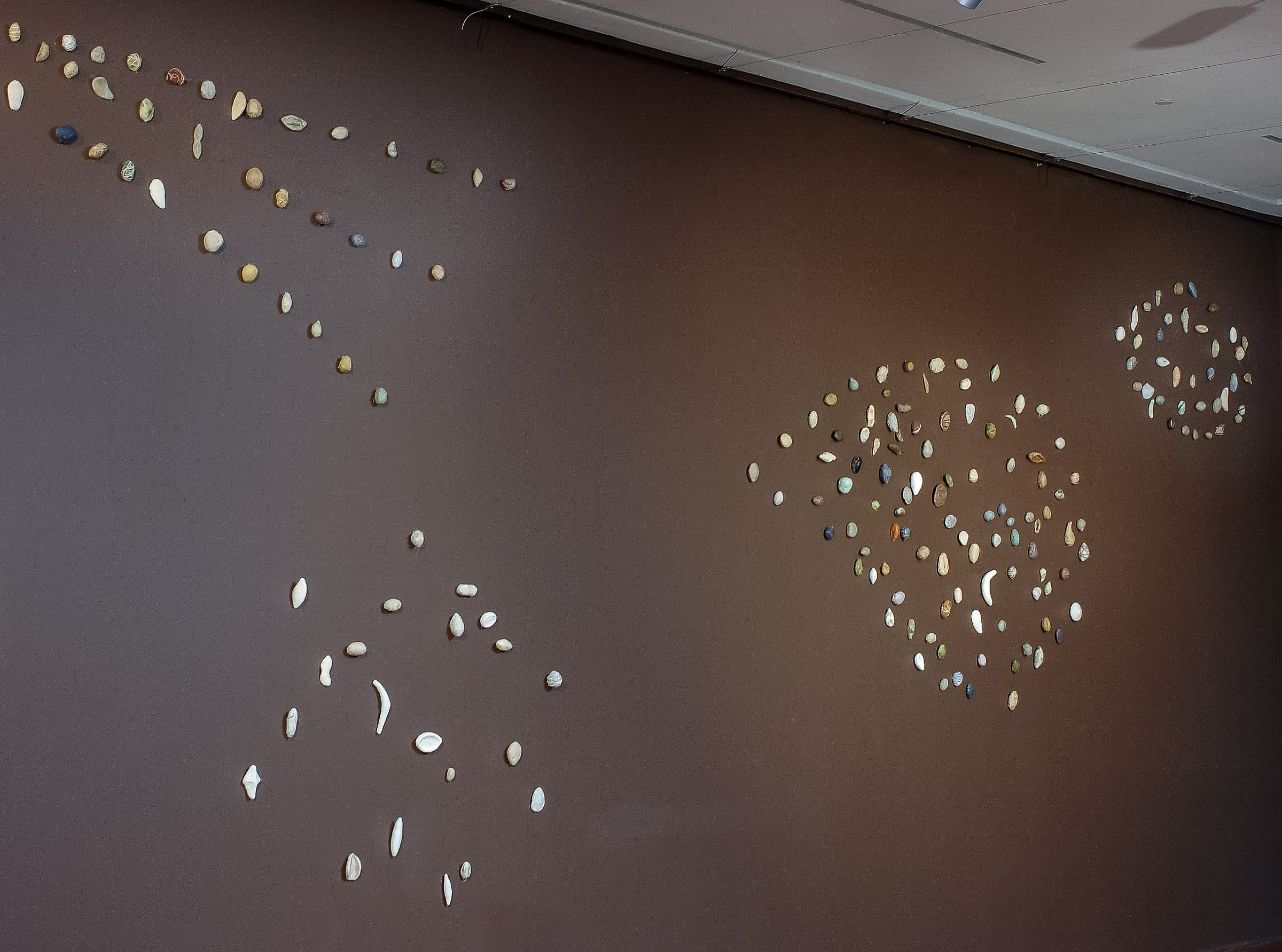 Cosmos Installation- 300 Paper Mache pods-,mulberry paper, twine, raffia De Young Kimball Gallery 2009