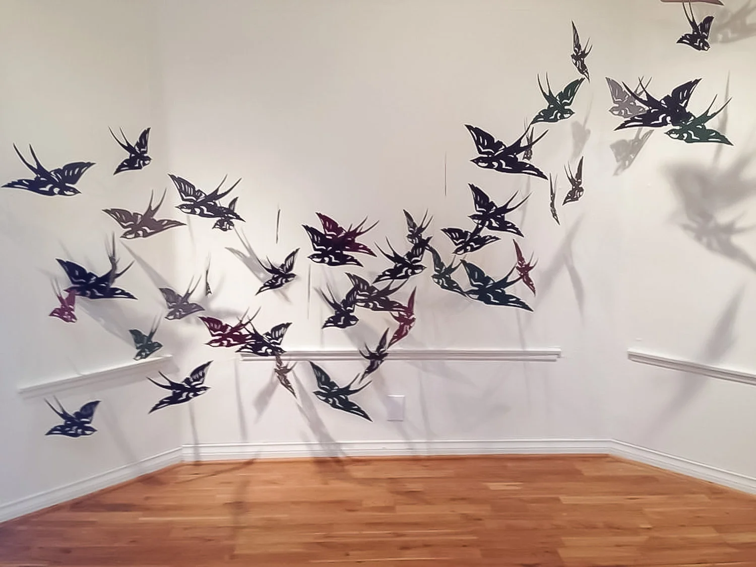 Our Spirits Still Fly Free Installation- Hand-cut paper and monofilament Oxnard College 2014
