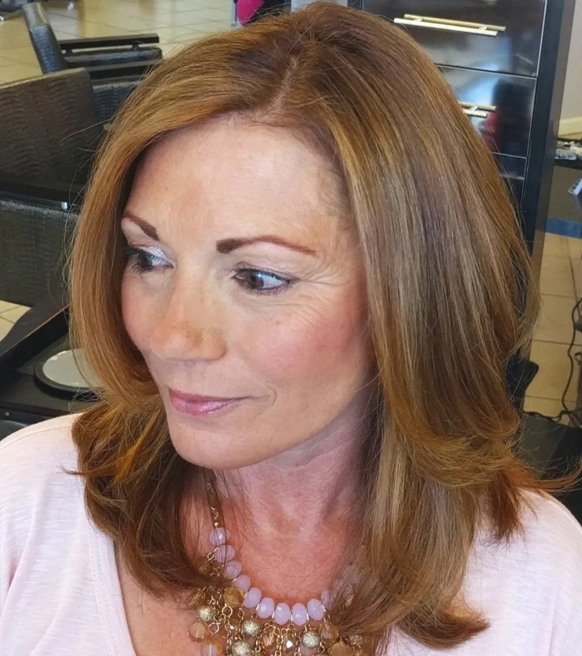 Auburn haircolor with Highlights with Long Layers