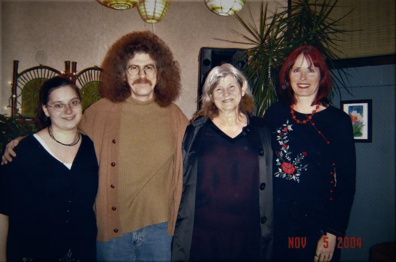 Left to right: Heather Grady (friend), George Kalamaras, Judith Johnson, and Mary Ann Cain (George's wife), following a reading that Judy and Mary Ann gave at the Three Rivers Food Co-op, Fort Wayne, Indiana, November, 2004.