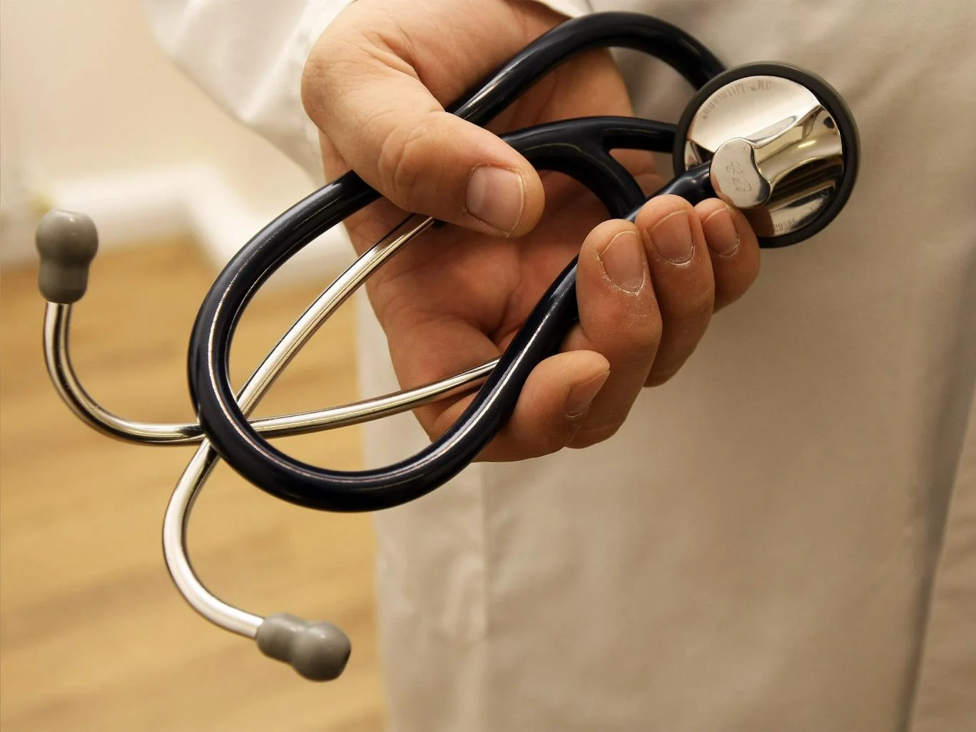Warning:  Heavy Burdens Being Carried By Doctor