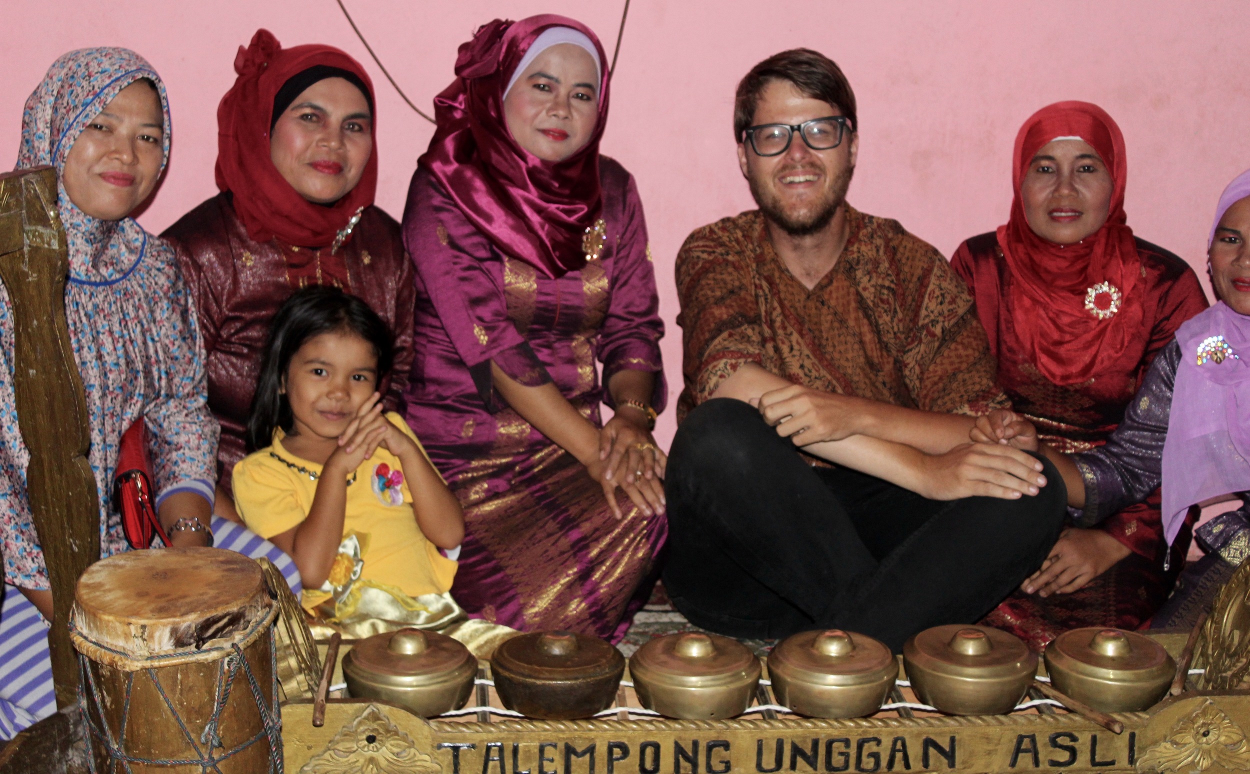 One of the woman's husbands made continuous fart noises behind the photographer to make us laugh, provoking the most genuine smile I've had in a photo for quite a while.