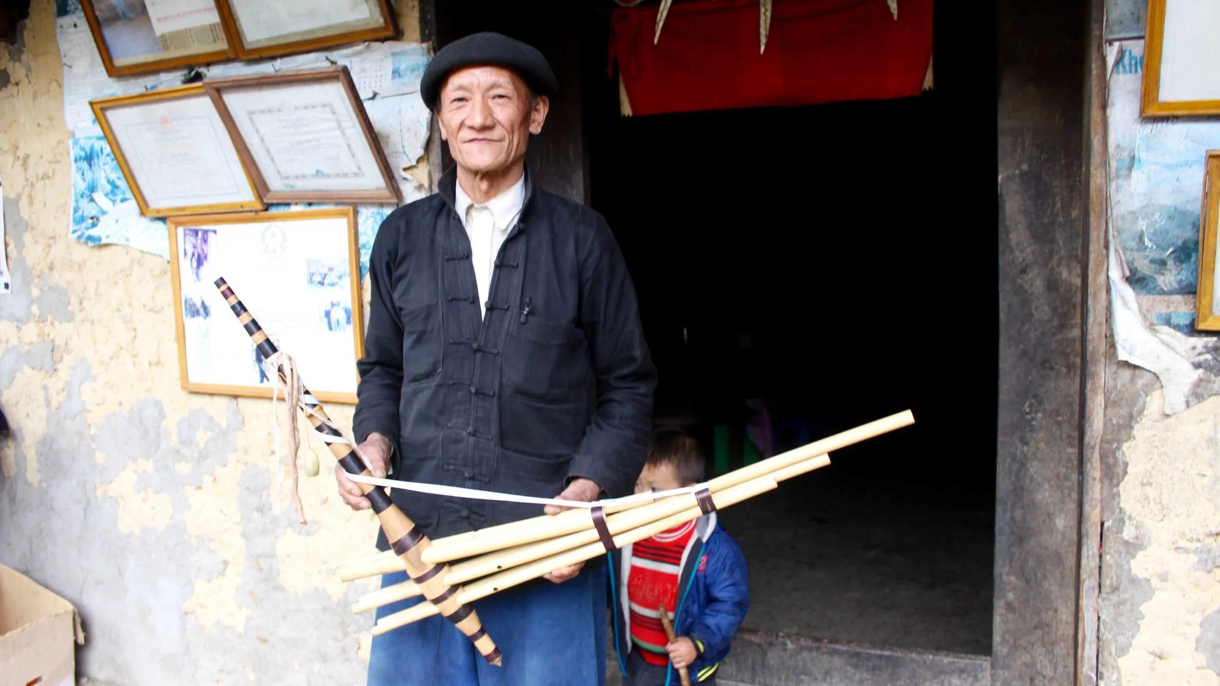 A Hmong man and his qeej mouth organ in Ha Giang, Vietnam.