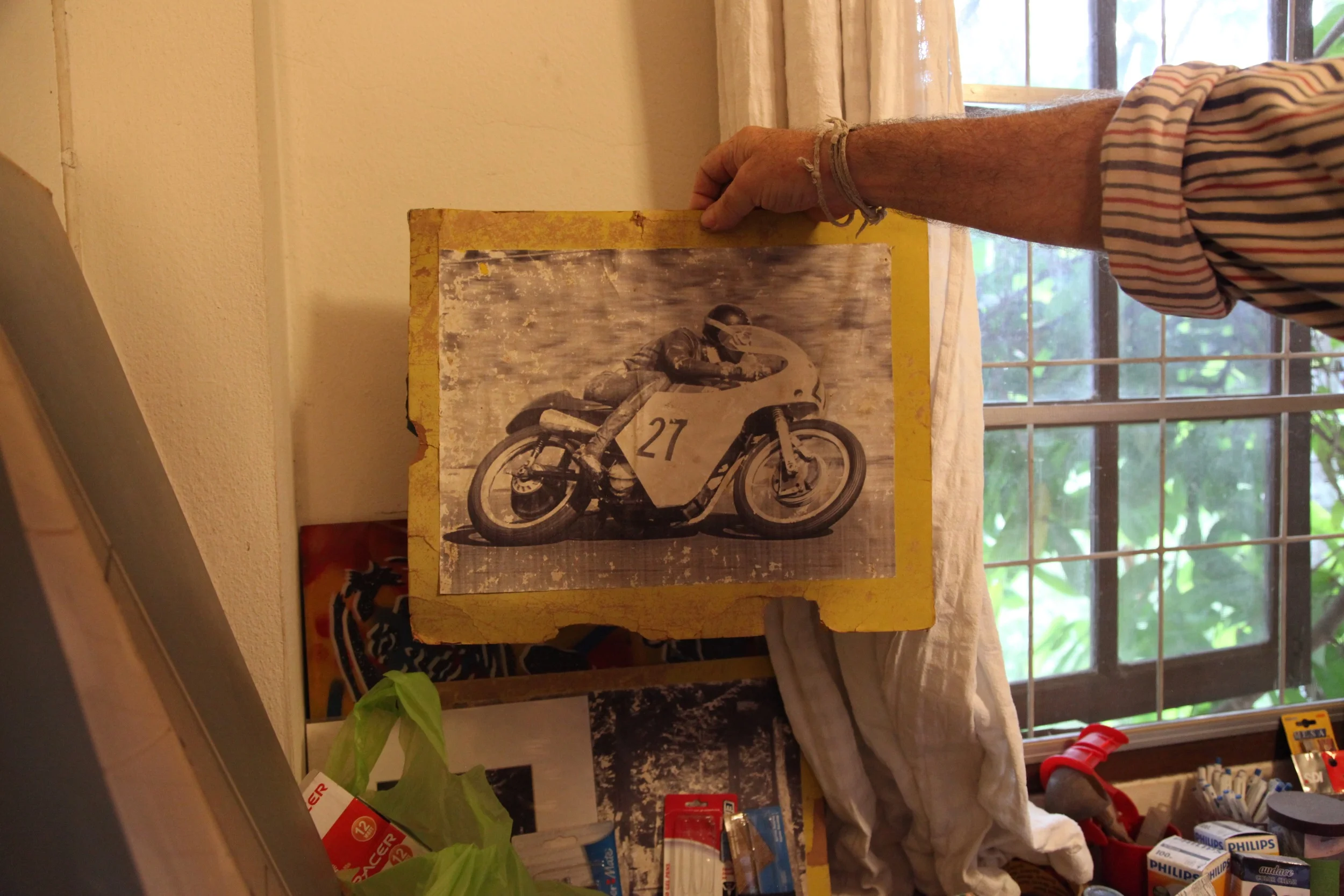 Christopher showing us a picture of his brother. He was a professional racer.